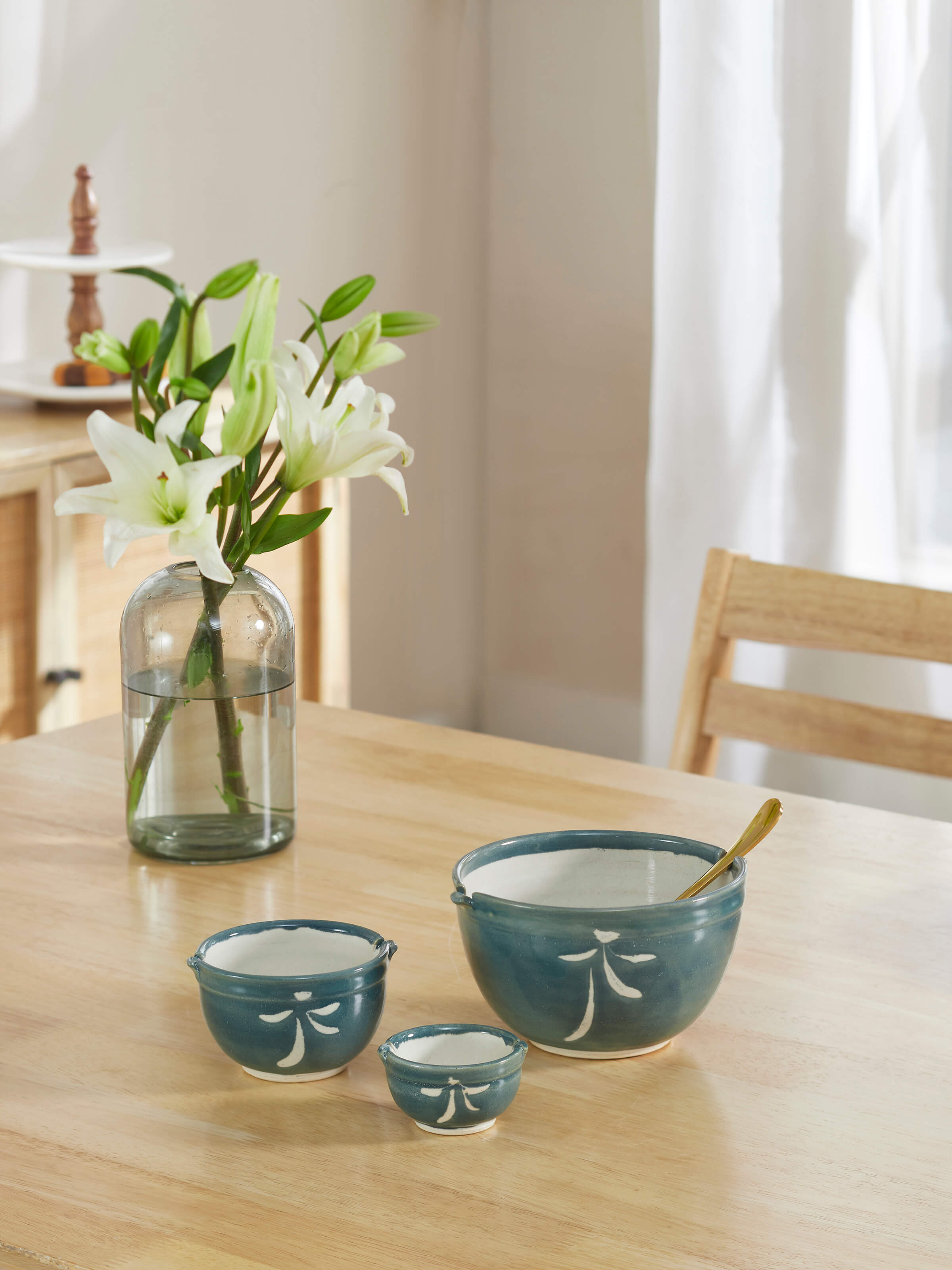 Close-up view of Natural Sheesham Wood Topsy Turvy Candle Holder highlighting the wood texture and finish.