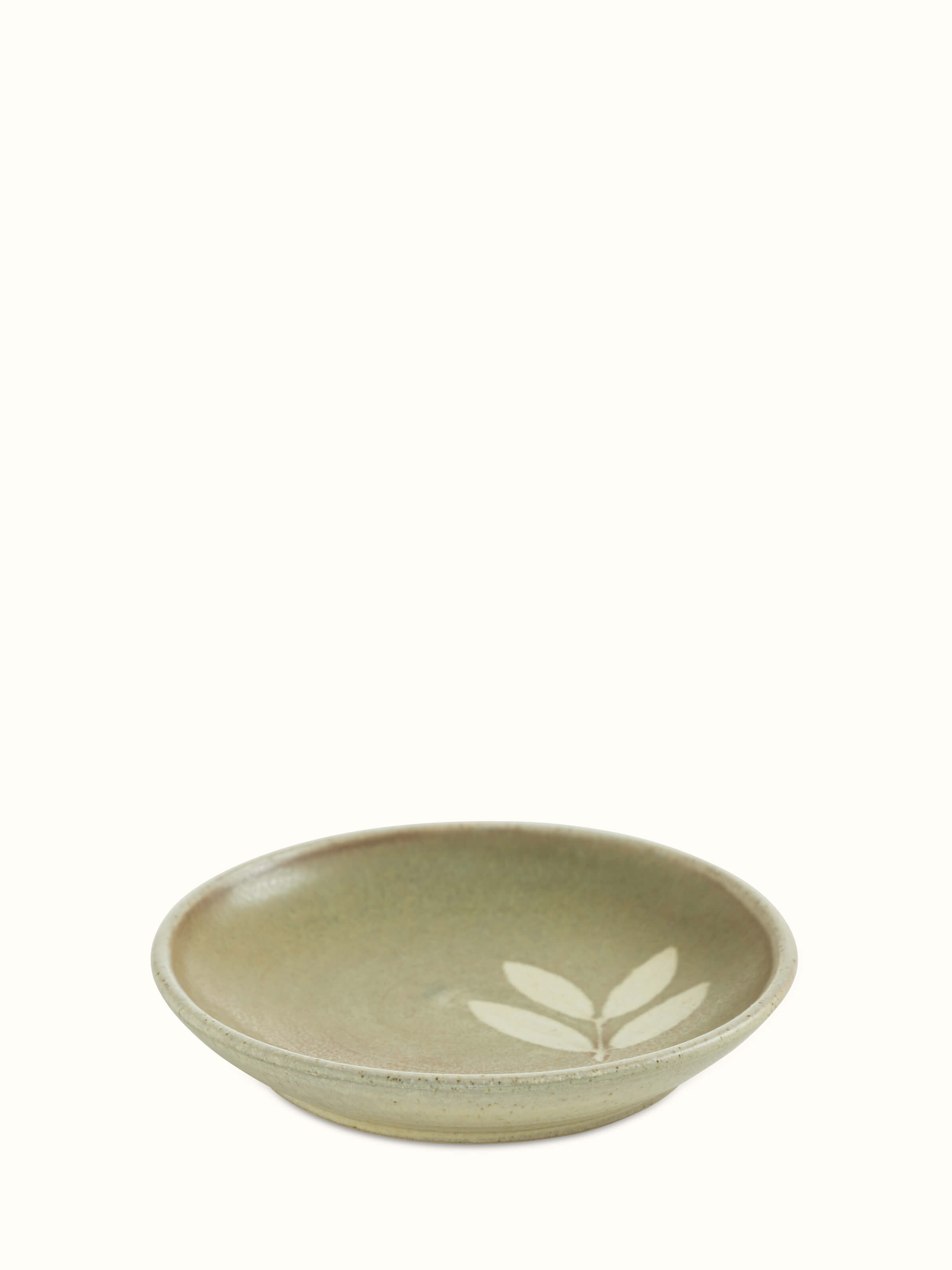 Front view of Studio pottery ceramic salad plate in brown