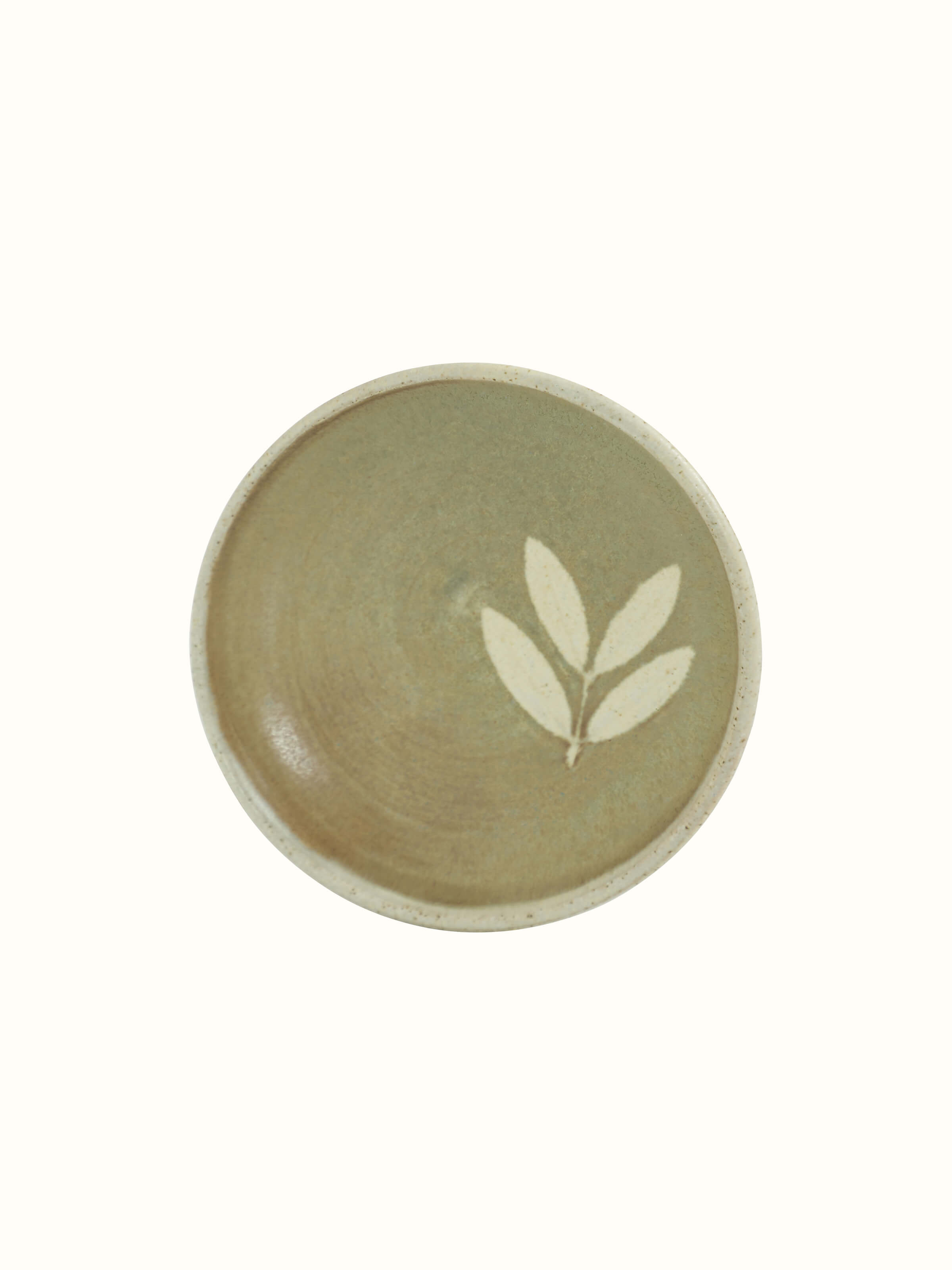 Angle view of Studio pottery ceramic salad plate in brown
