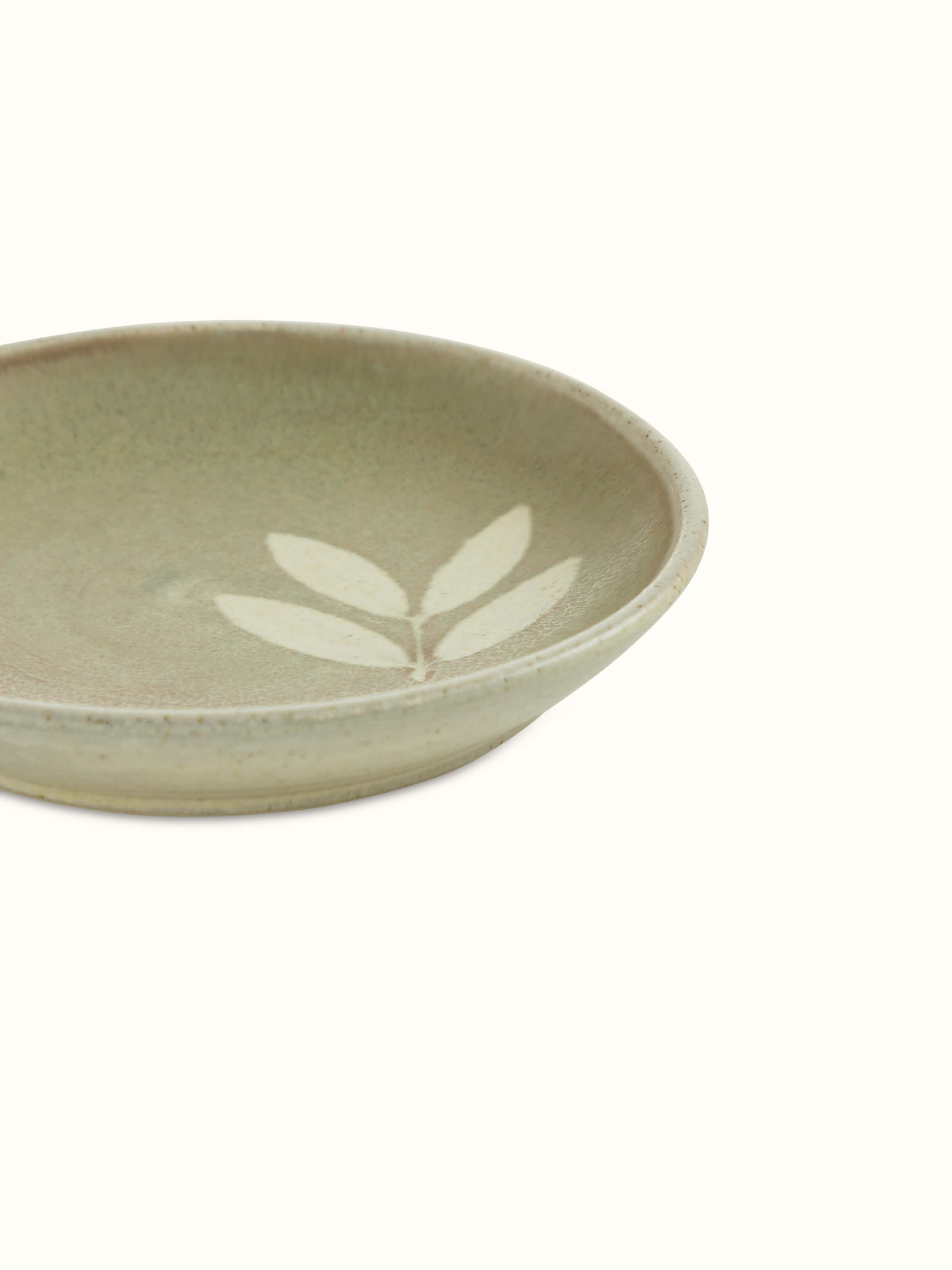 Top view of Studio pottery ceramic salad plate in brown