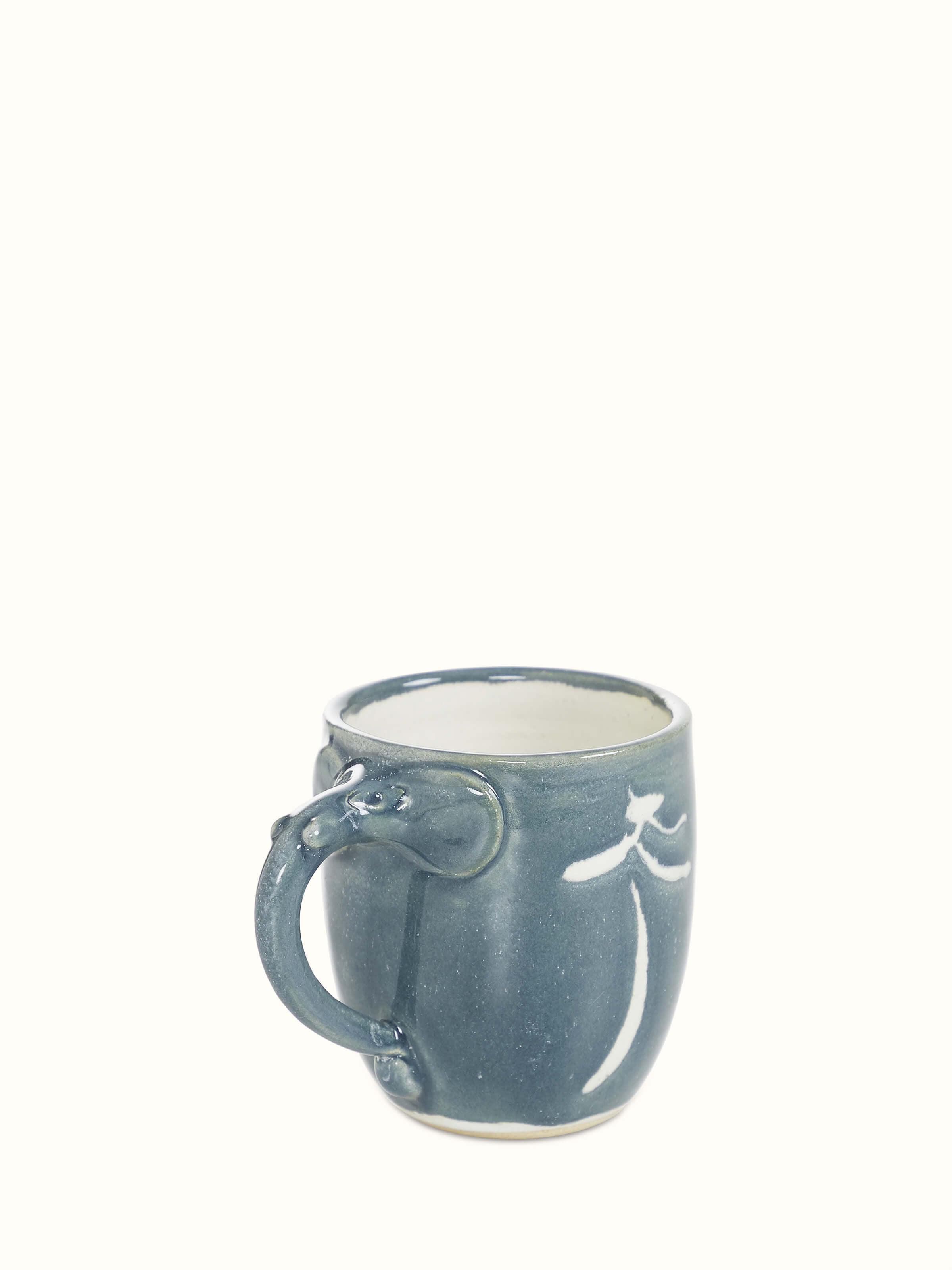 Top view of the studio pottery ceramic coffee mug in blue, highlighting its smooth finish and rim.