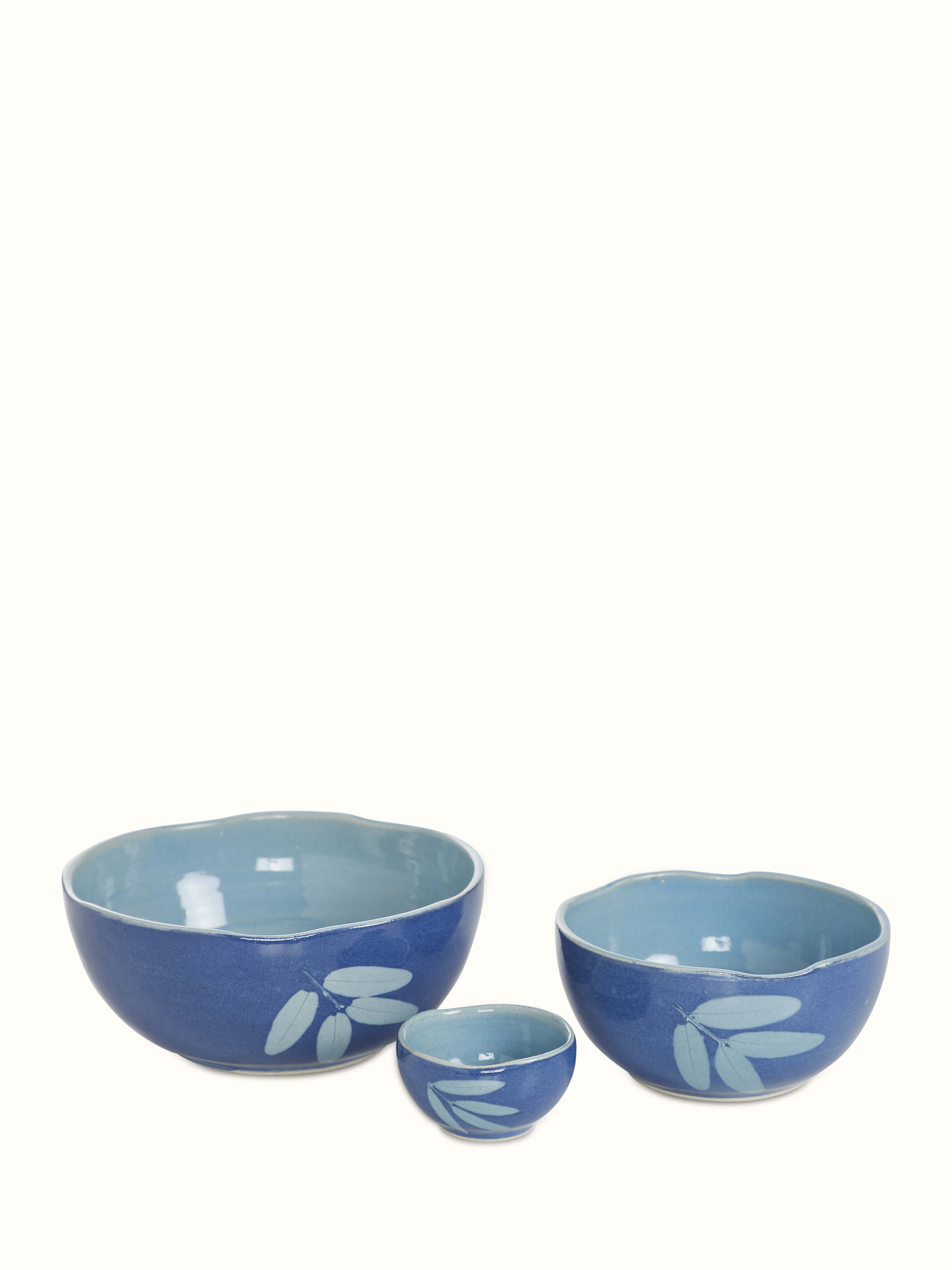 Front view of Studio pottery ceramic serving bowls in blue (3 pcs) showcasing elegant glaze