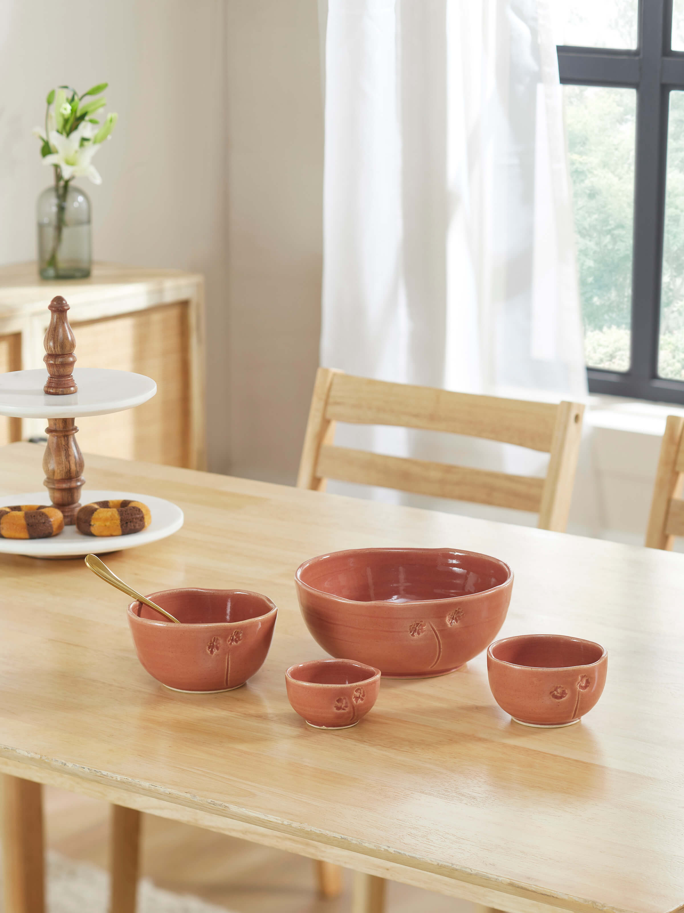 Side view of studio pottery ceramic round serving bowls (4 pcs) showcasing smooth finish