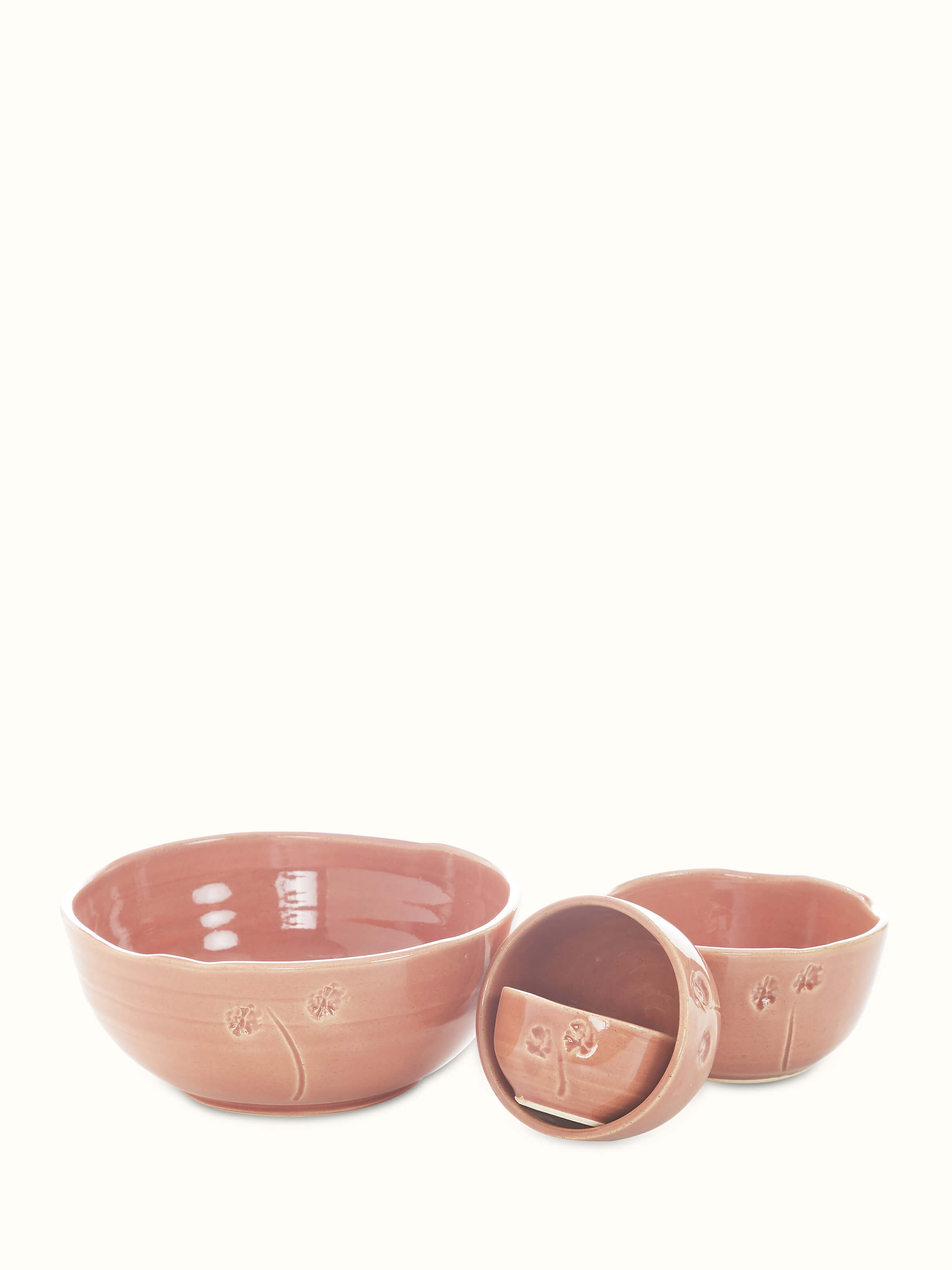 Detailed view of studio pottery ceramic round serving bowls (4 pcs) with intricate design
