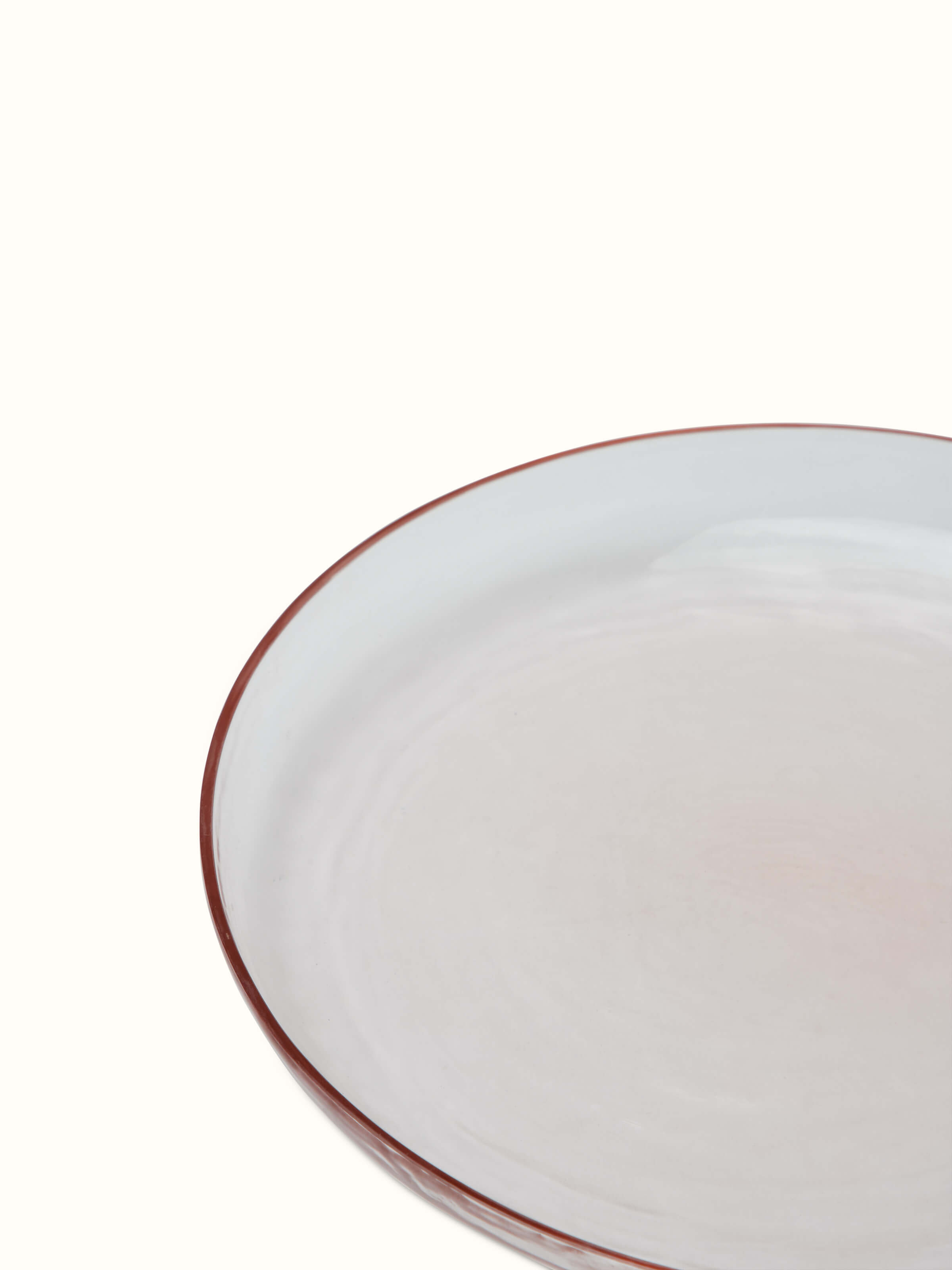 Detailed view of pink Firozabadi glass dinner plate, emphasizing its elegant design and finish.