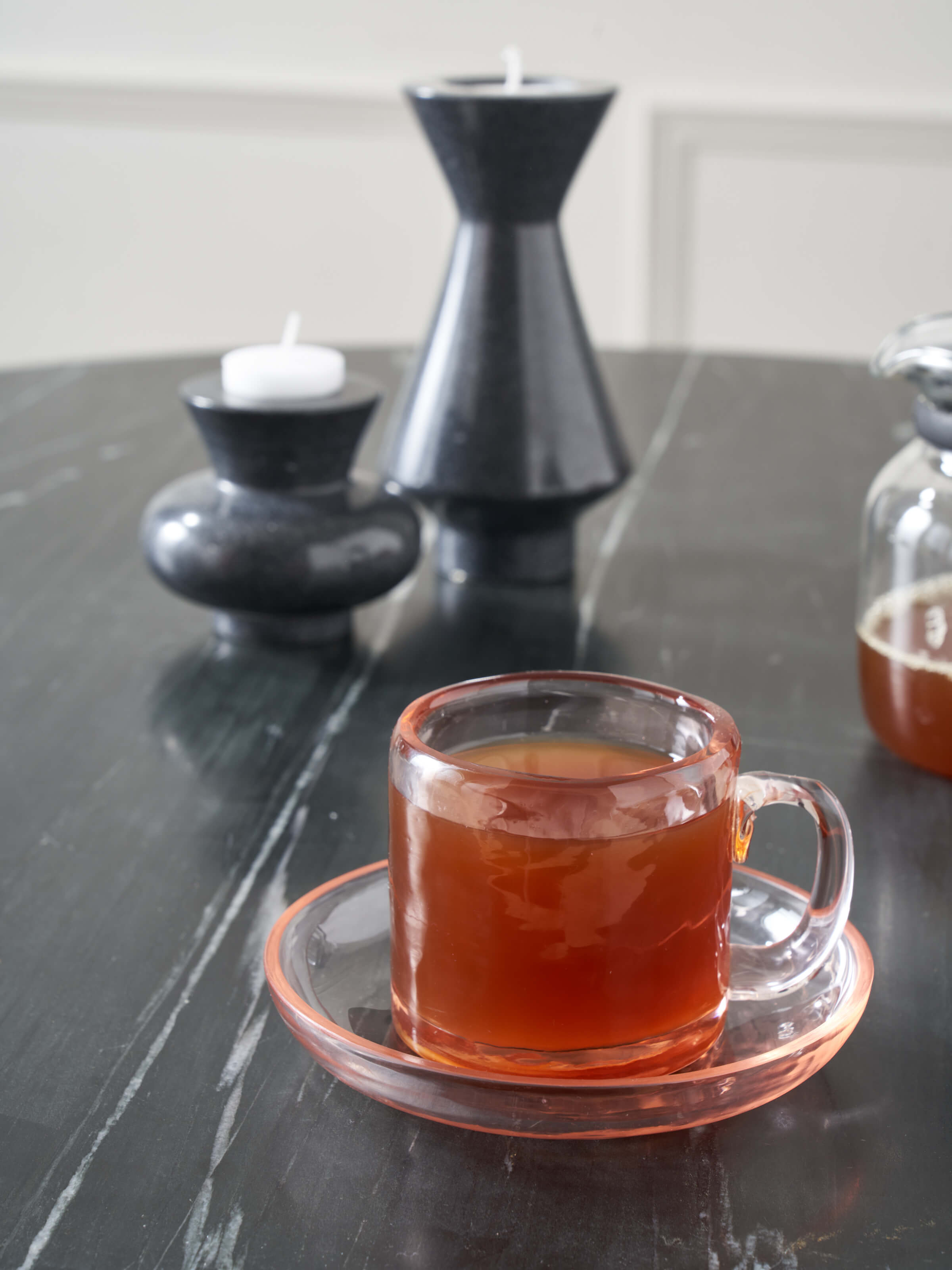 Side view of Firozabadi Coloured Glass Teacup & Saucer Set (2 pcs), highlighting the detailed glasswork and design