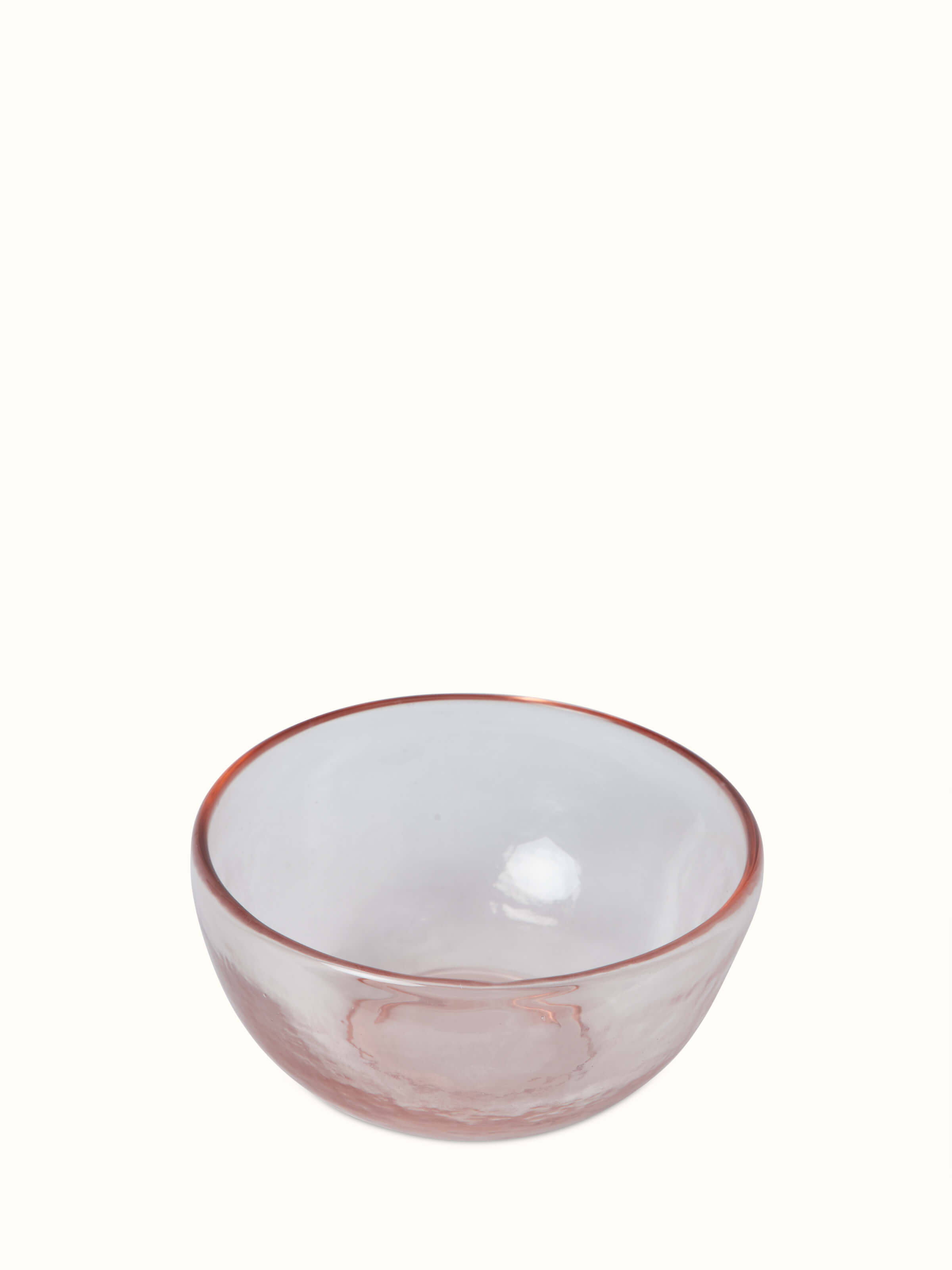 Close-up of Firozabadi glass serving bowl in pink, emphasizing its smooth surface and delicate design.