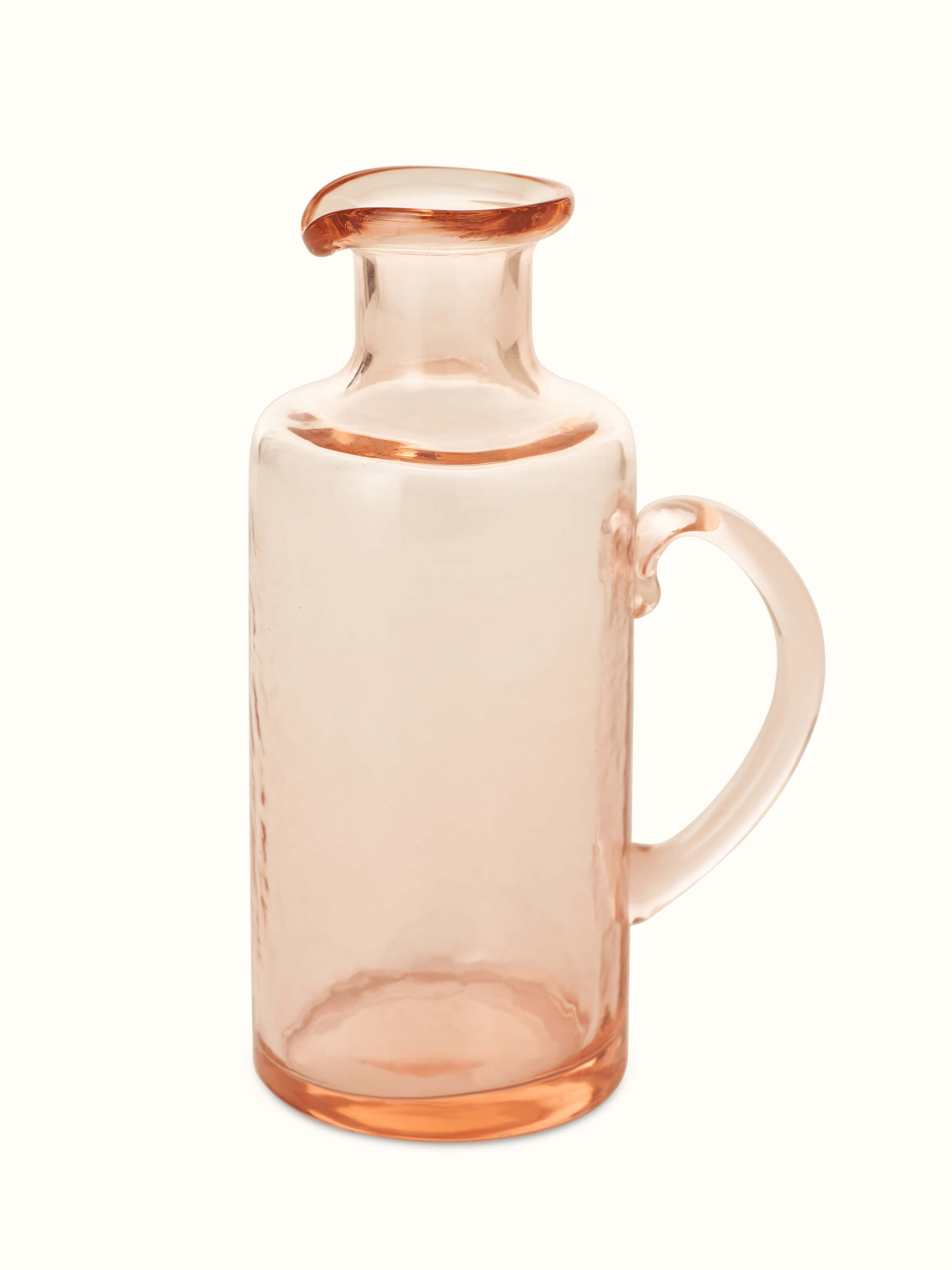 Side view of Firozabadi glass pitcher in pink color highlighting its elegant shape.