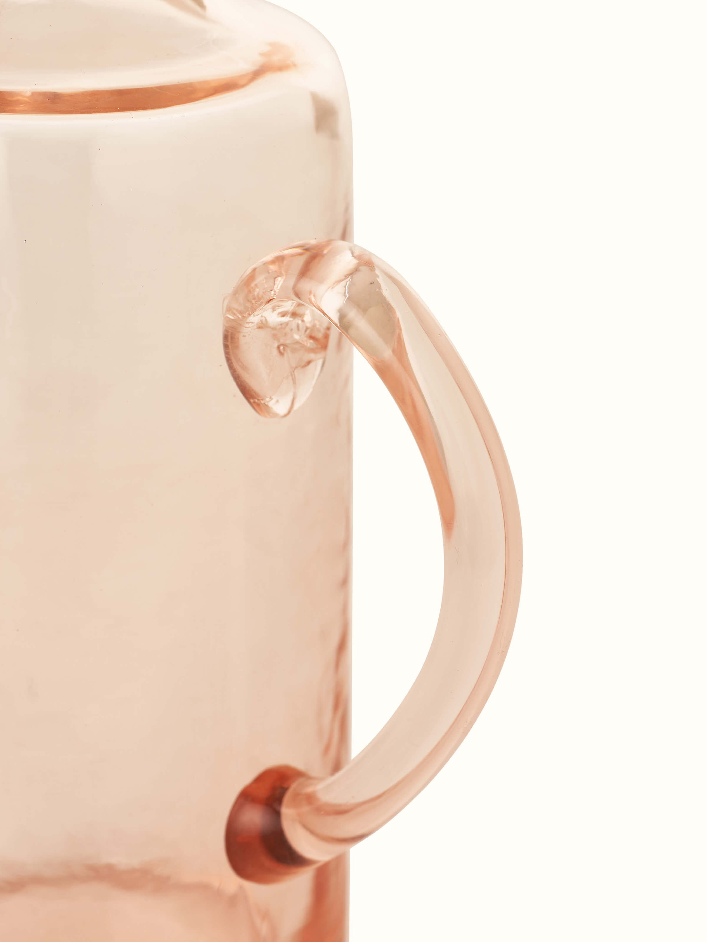 Full view of Firozabadi glass pitcher in pink demonstrating its classic design.