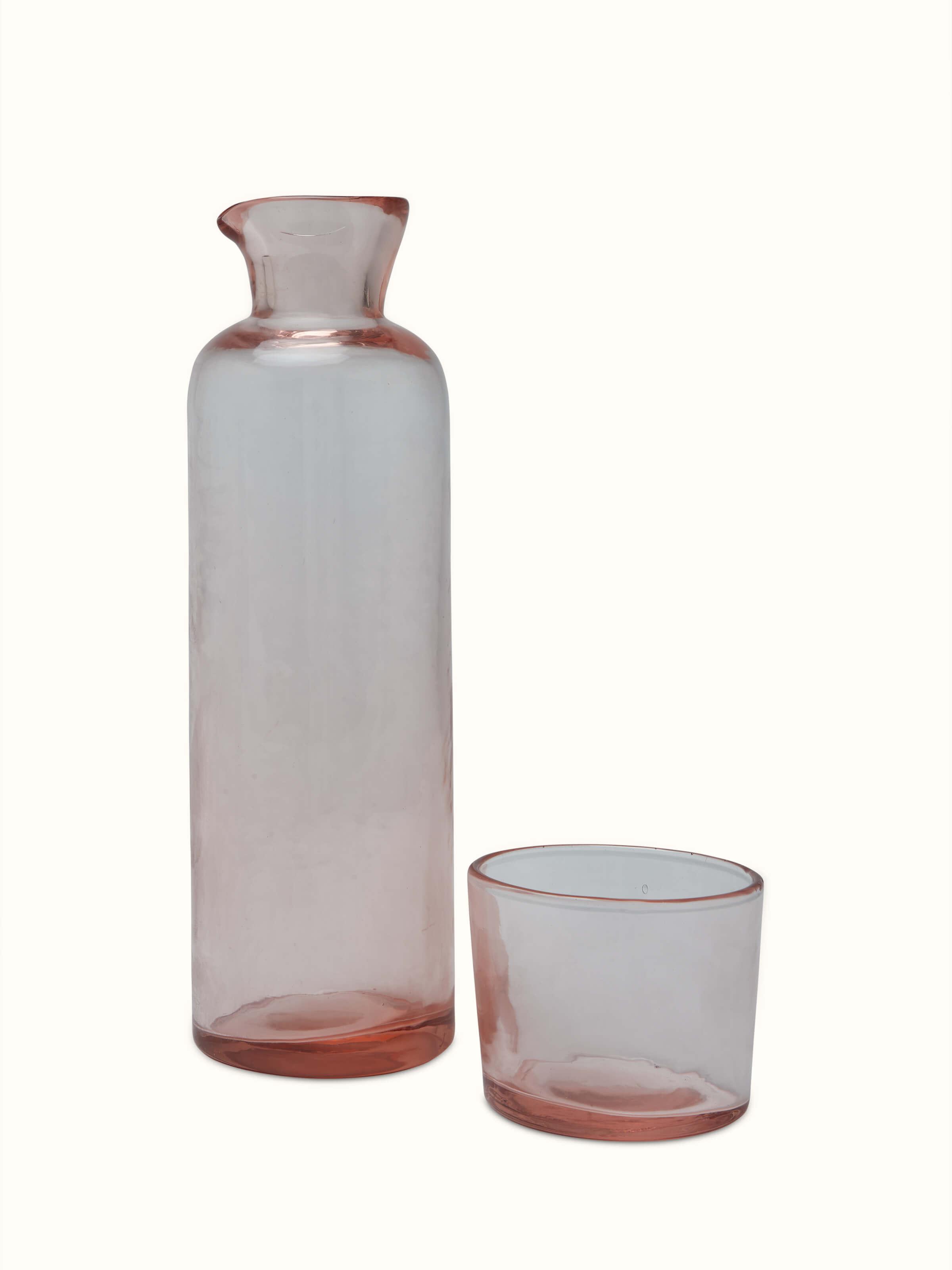 Front view of Firozabadi Glass Carafe (Pink) with sleek design.