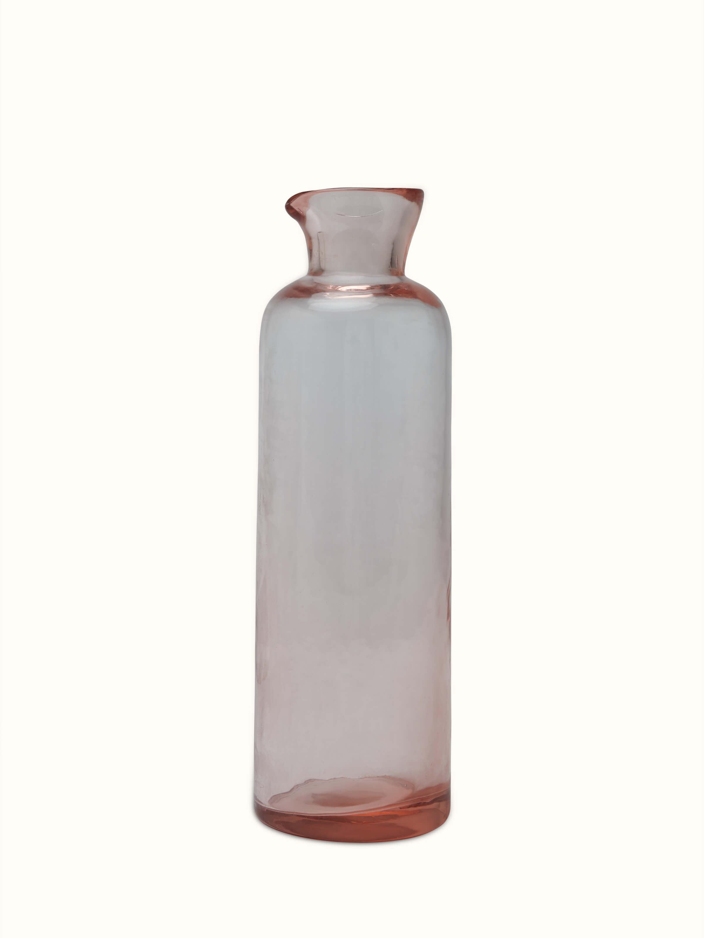 Detailed view of Firozabadi Glass Carafe (Pink) with focus on texture.