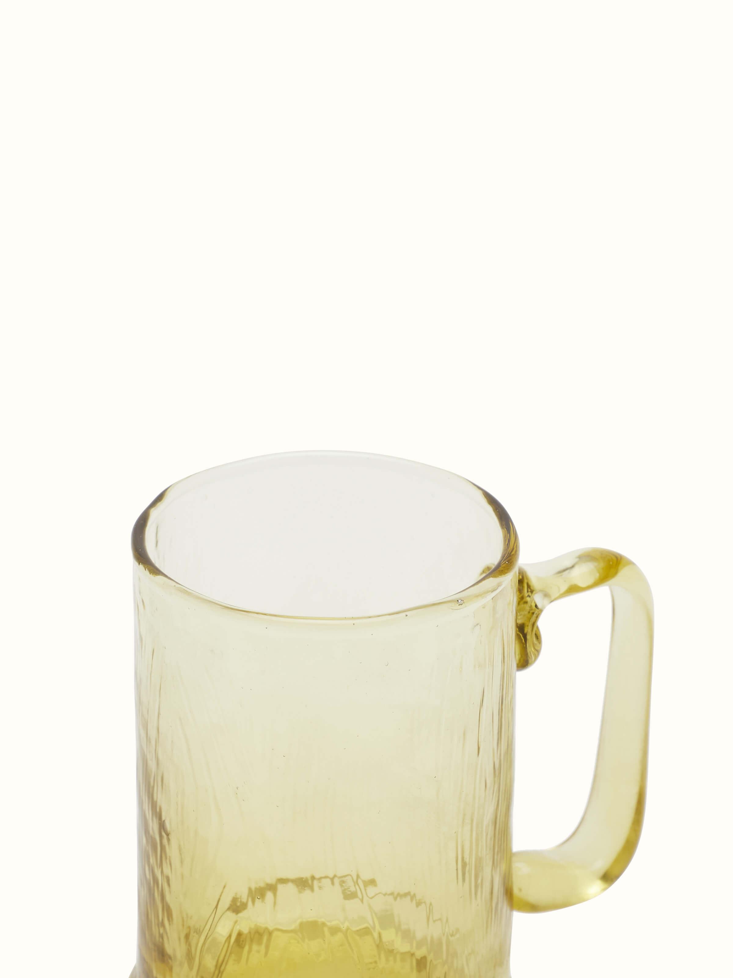 Close-up view of Soda-lime glass-worked beer mugs (2 pcs)