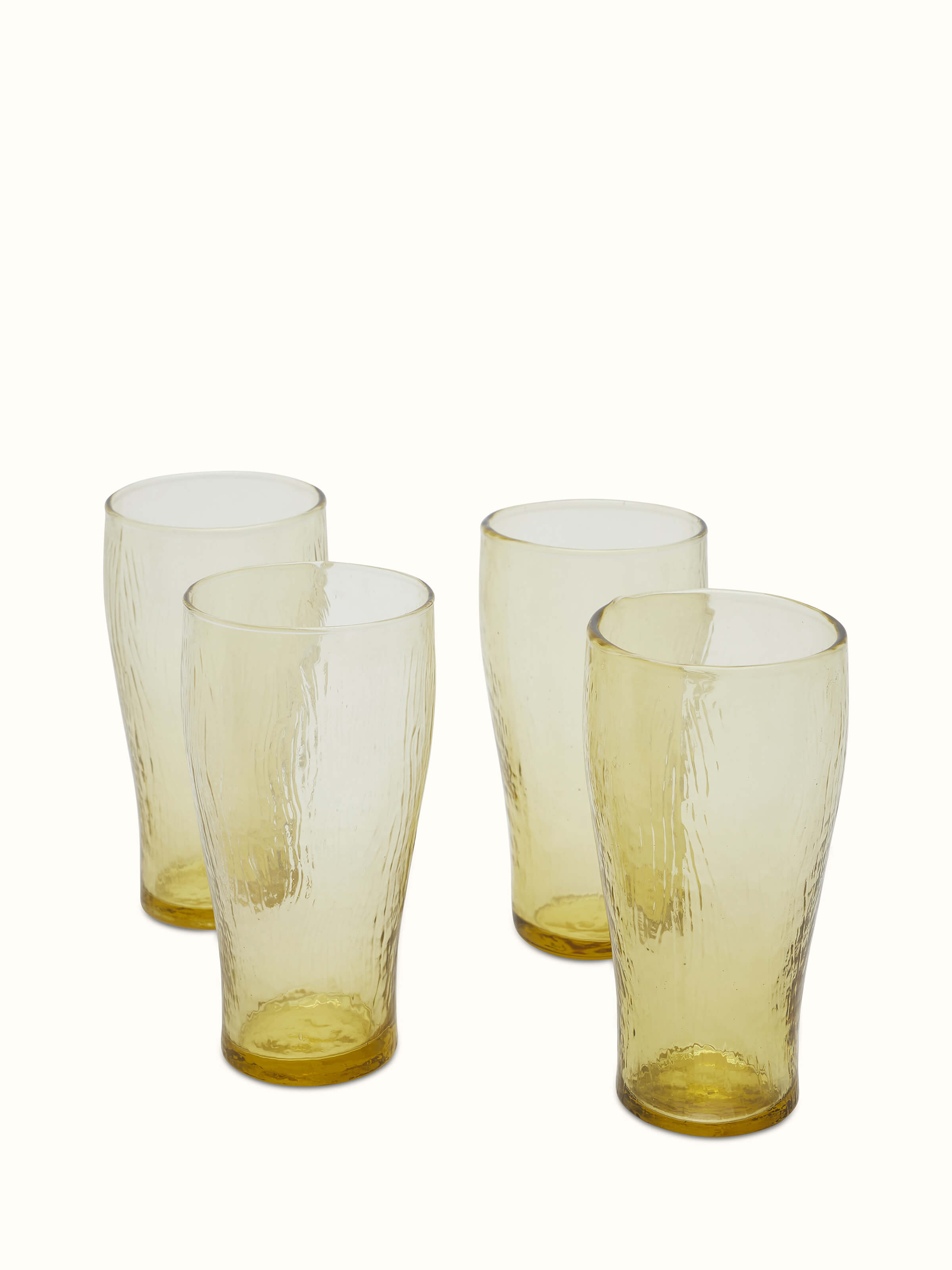 Full set view of soda-lime glass-worked beer glasses, showcasing their unique design and clear, polished finish