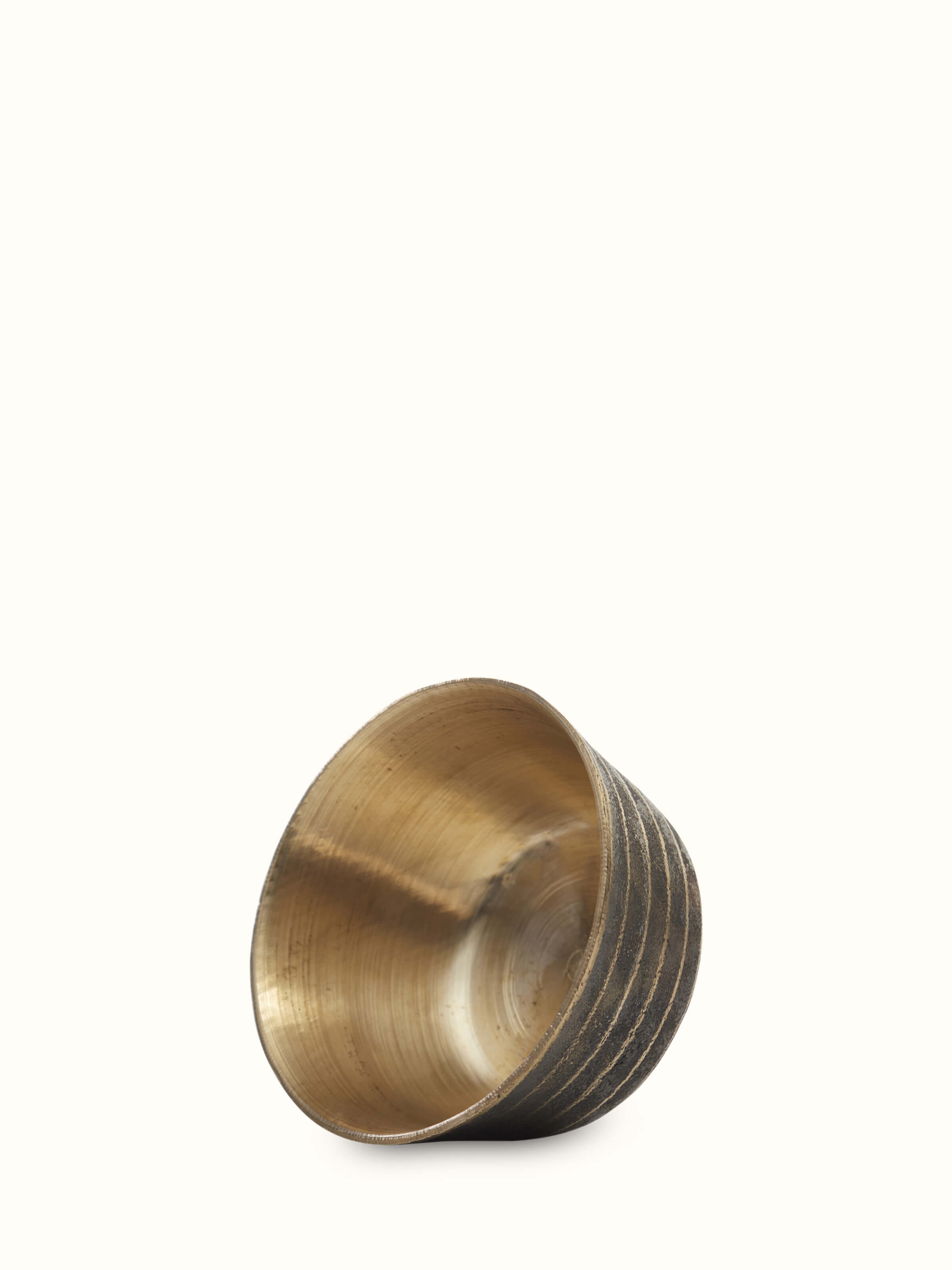 Angled view of black bell metal dinner bowls set of 4 highlighting smooth surface and elegant design