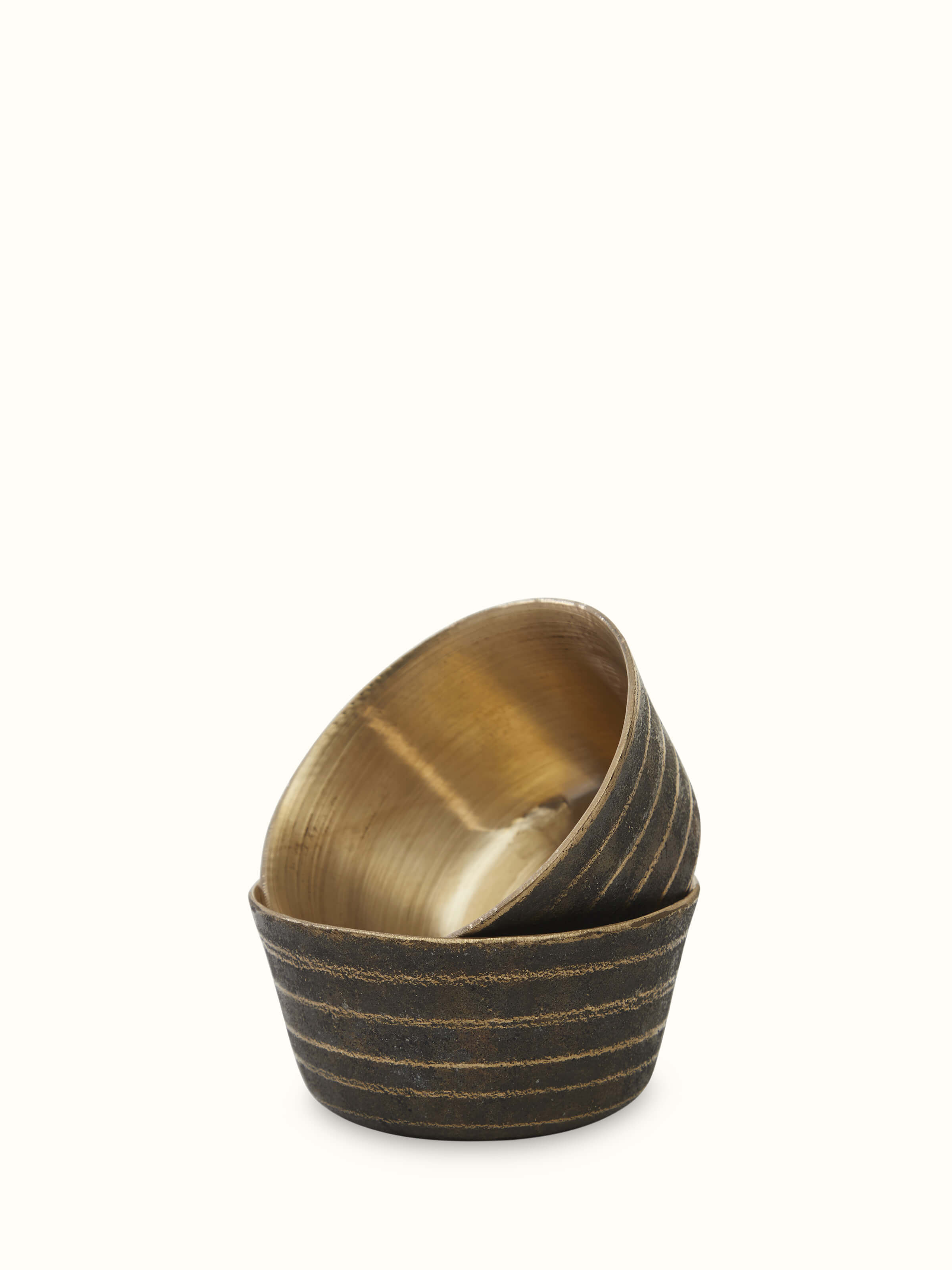 Close-up of black bell metal dinner bowls set of 4 showing detailed craftsmanship and durable material