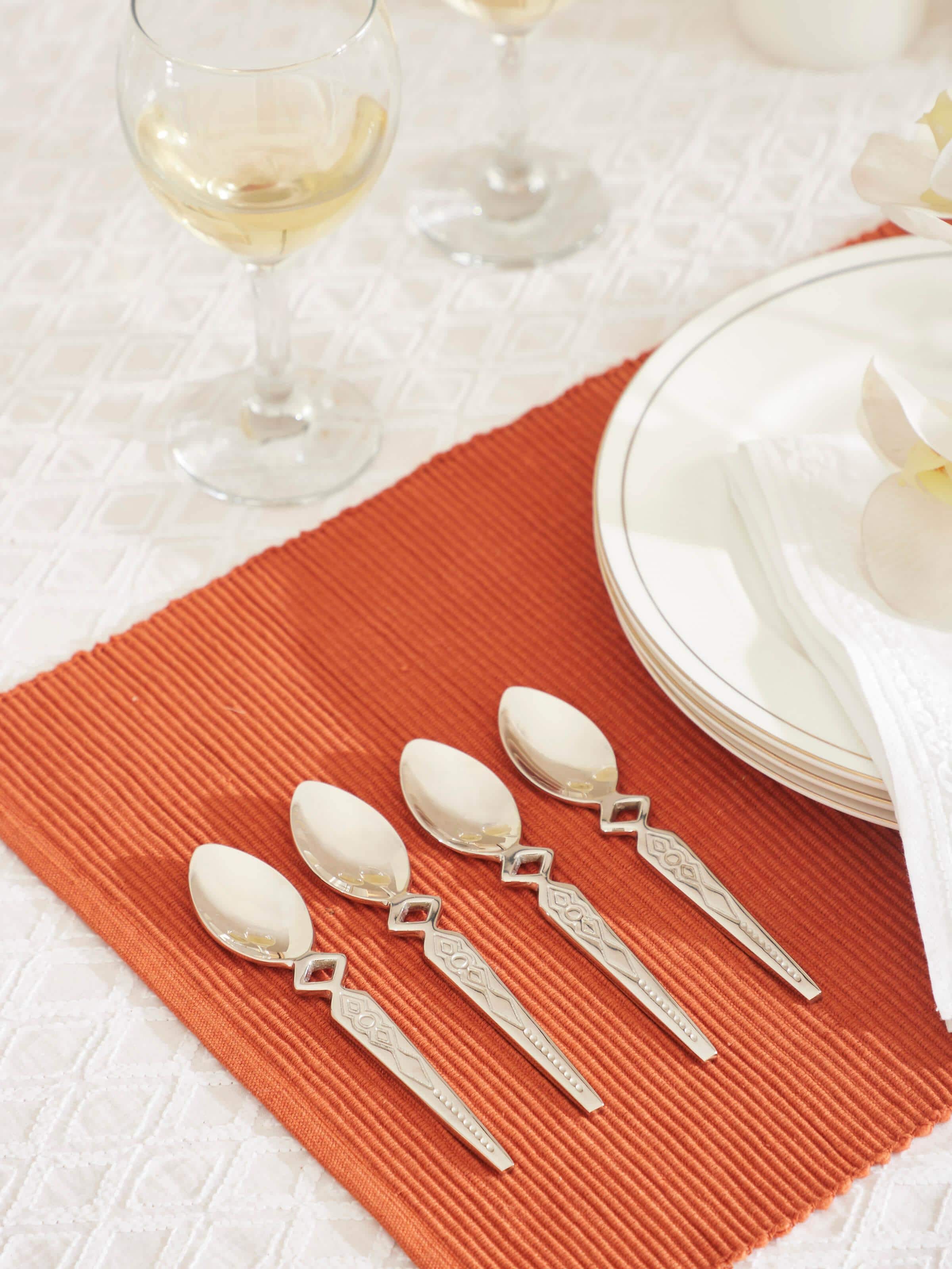 Side view of Brass Teaspoons (4 pcs), highlighting the intricate detailing and smooth finish