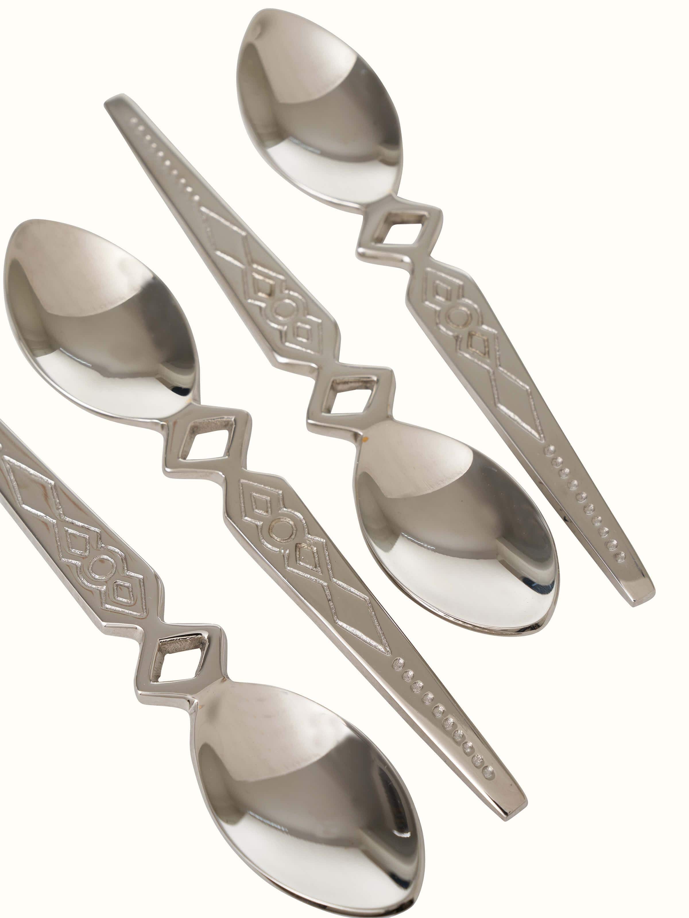 Close-up of Brass Teaspoons (4 pcs), emphasizing the craftsmanship and shine of the brass