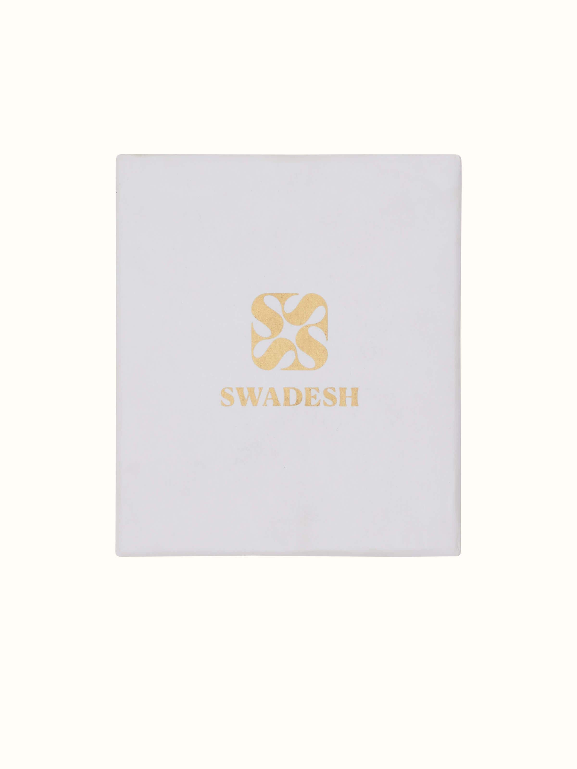 Side view of brass teaspoons, emphasizing their fine craftsmanship and durable material.