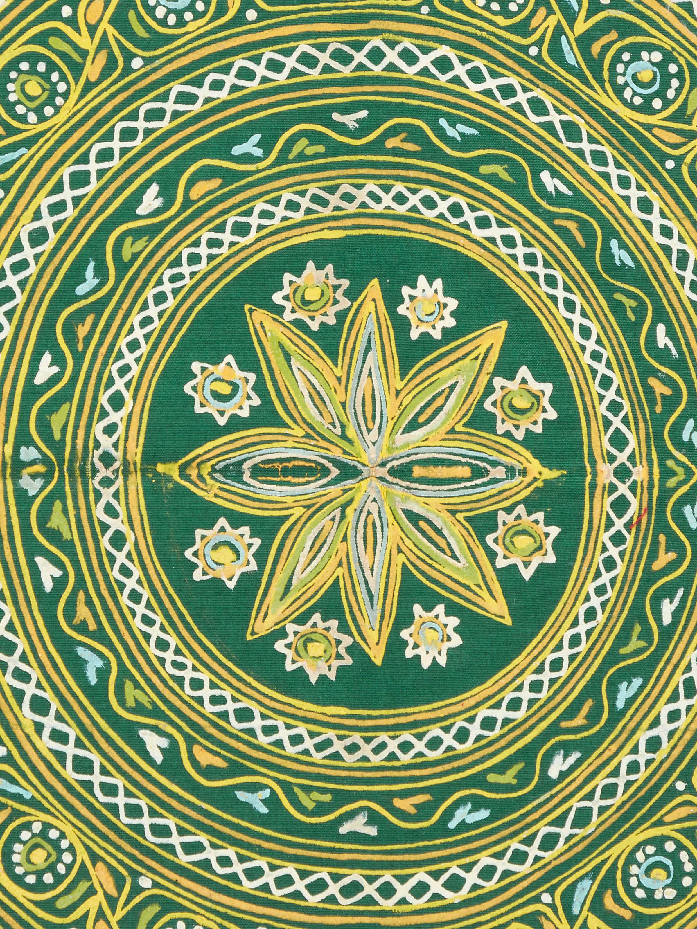 Close-up of Rogan castor oil & pigment mandala painting illustrating texture and depth