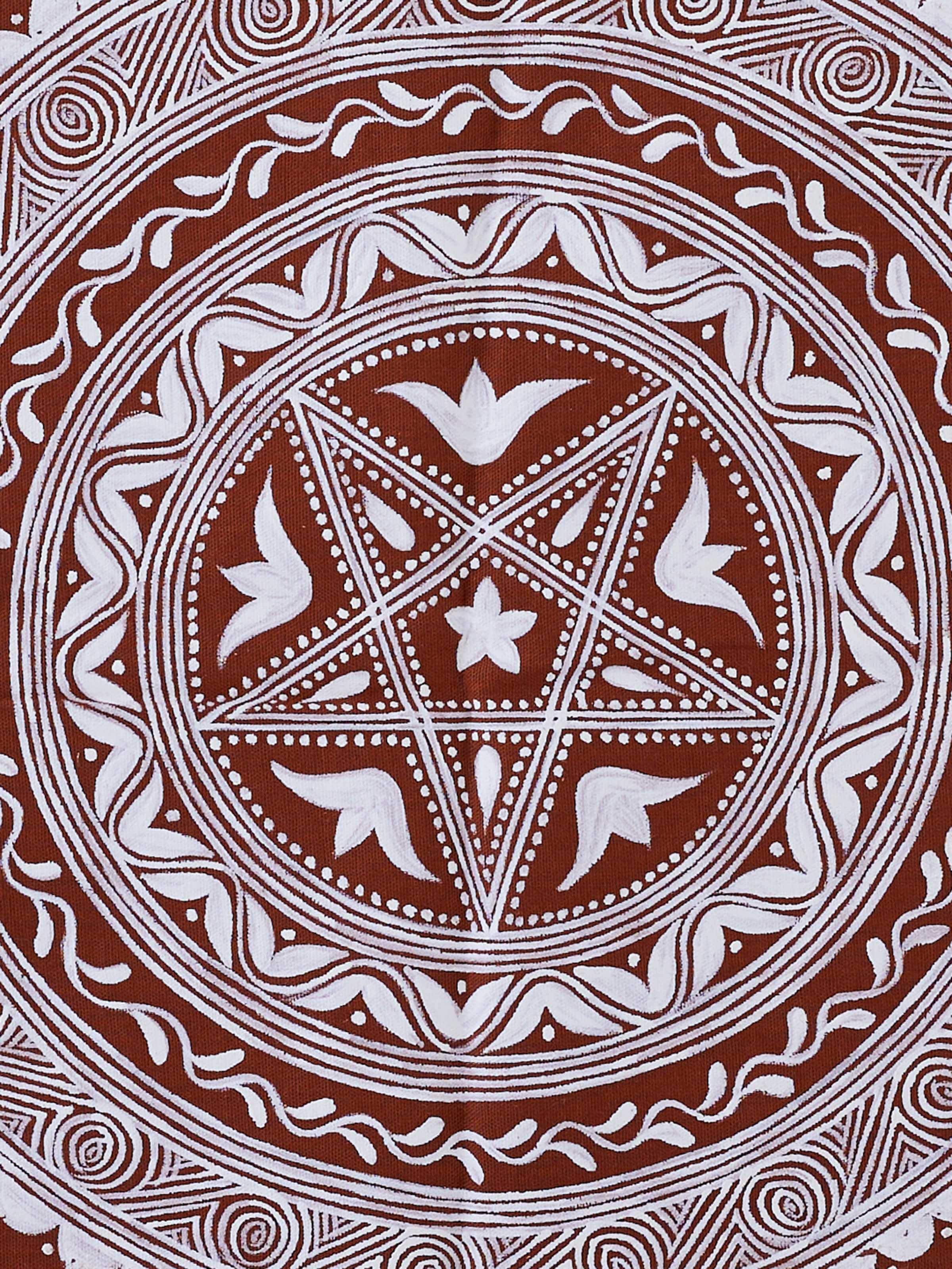 Detailed view of Aipan Saraswati chowki painting highlighting the intricate patterns and traditional artistry