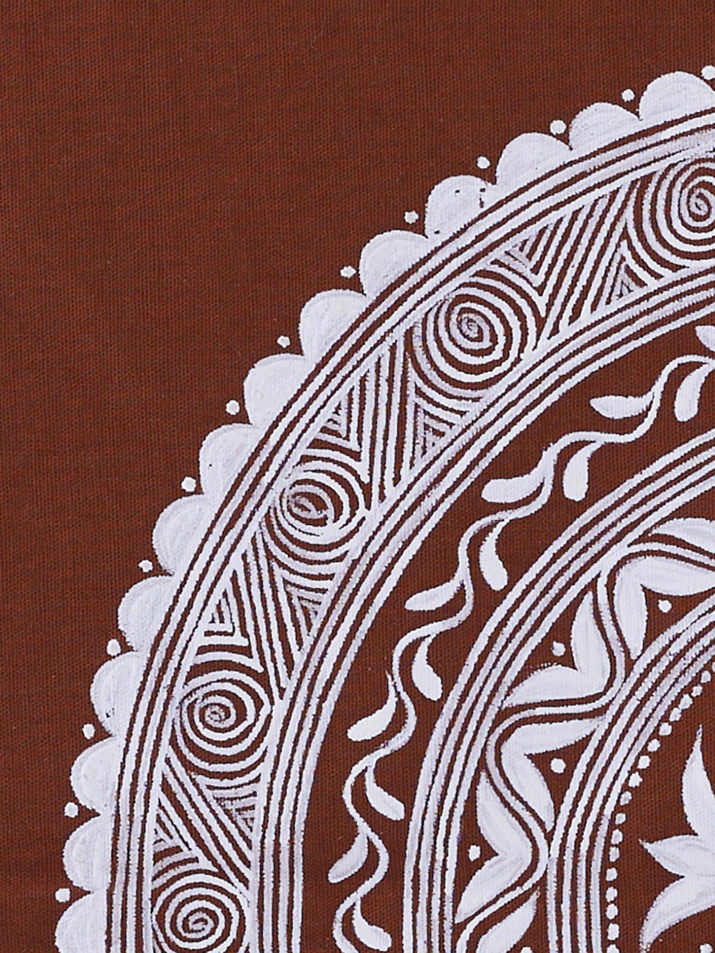 Close-up view of Aipan Saraswati chowki painting showcasing the fine details and vibrant Aipan design