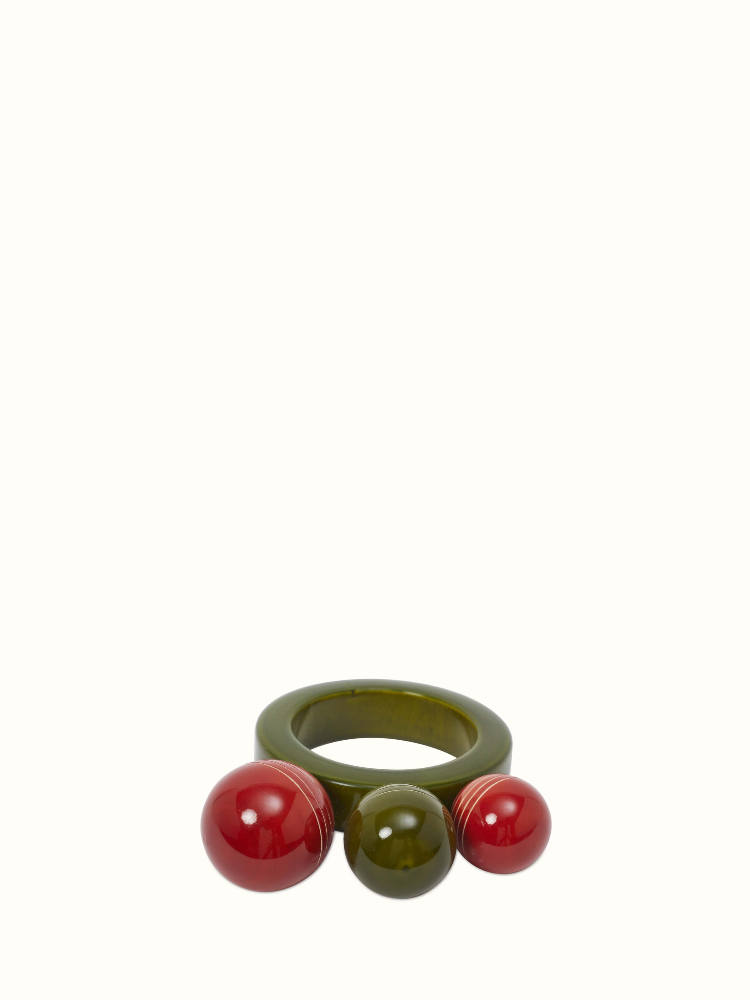 Channapatna ivory wood ball ring rattle toy in green, featuring a traditional design and vibrant color.