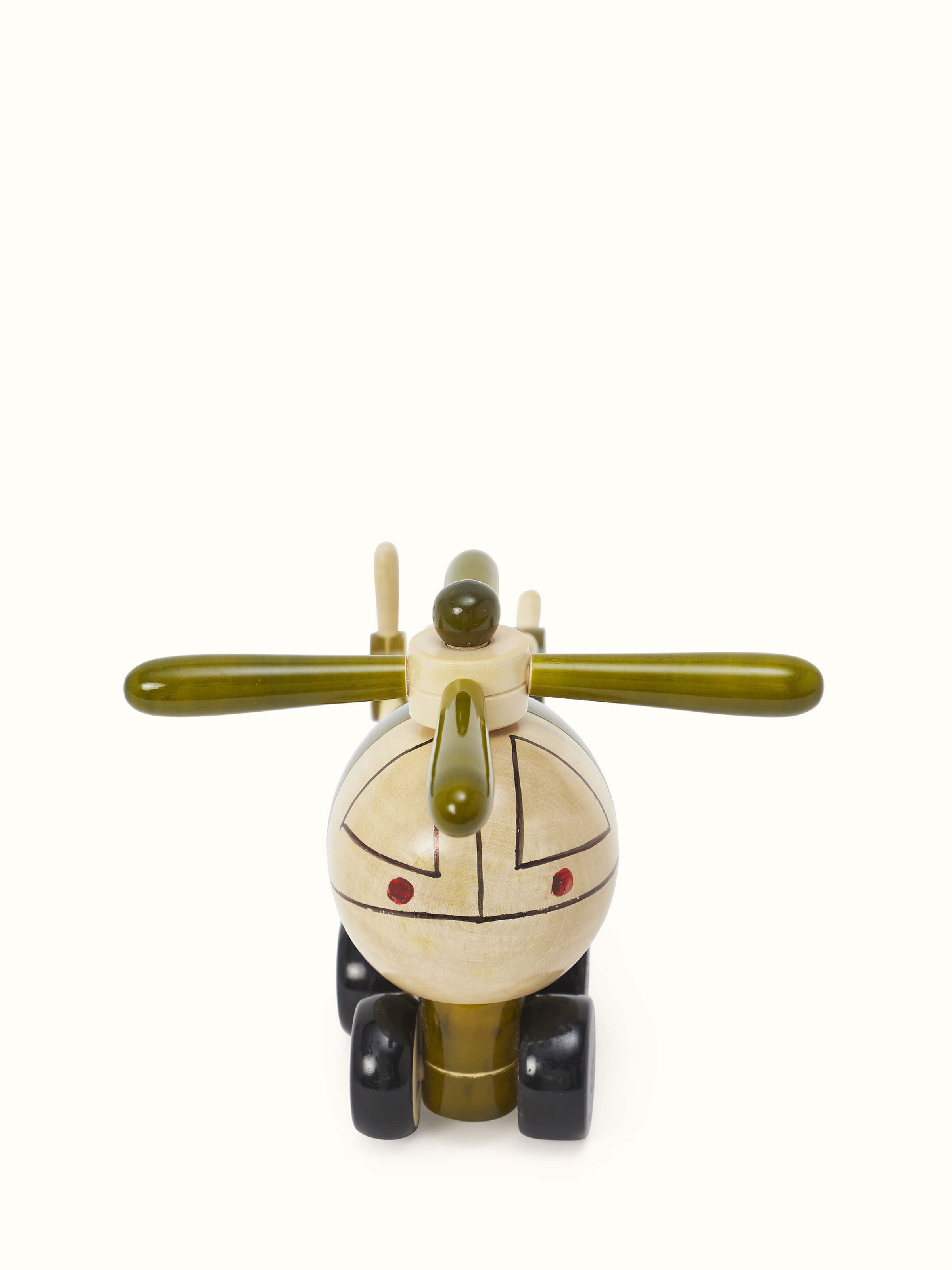 Front view of Channapatna ivory wood helicopter toy in green, showcasing the playful design.