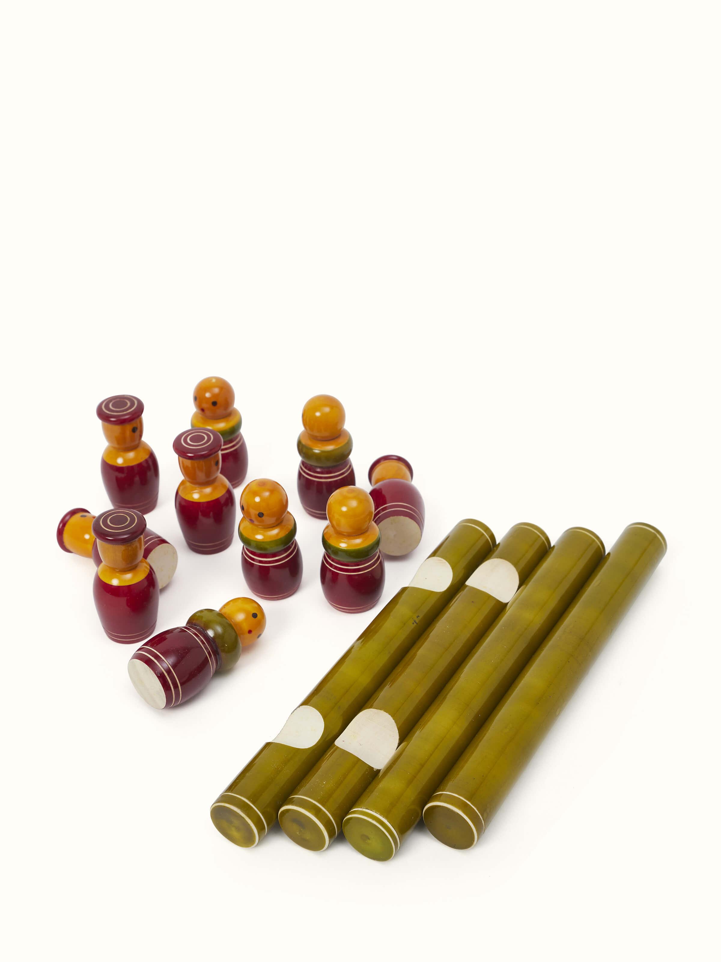 Top view of Channapatna ivory wood tic-tac game in green highlighting grid layout.