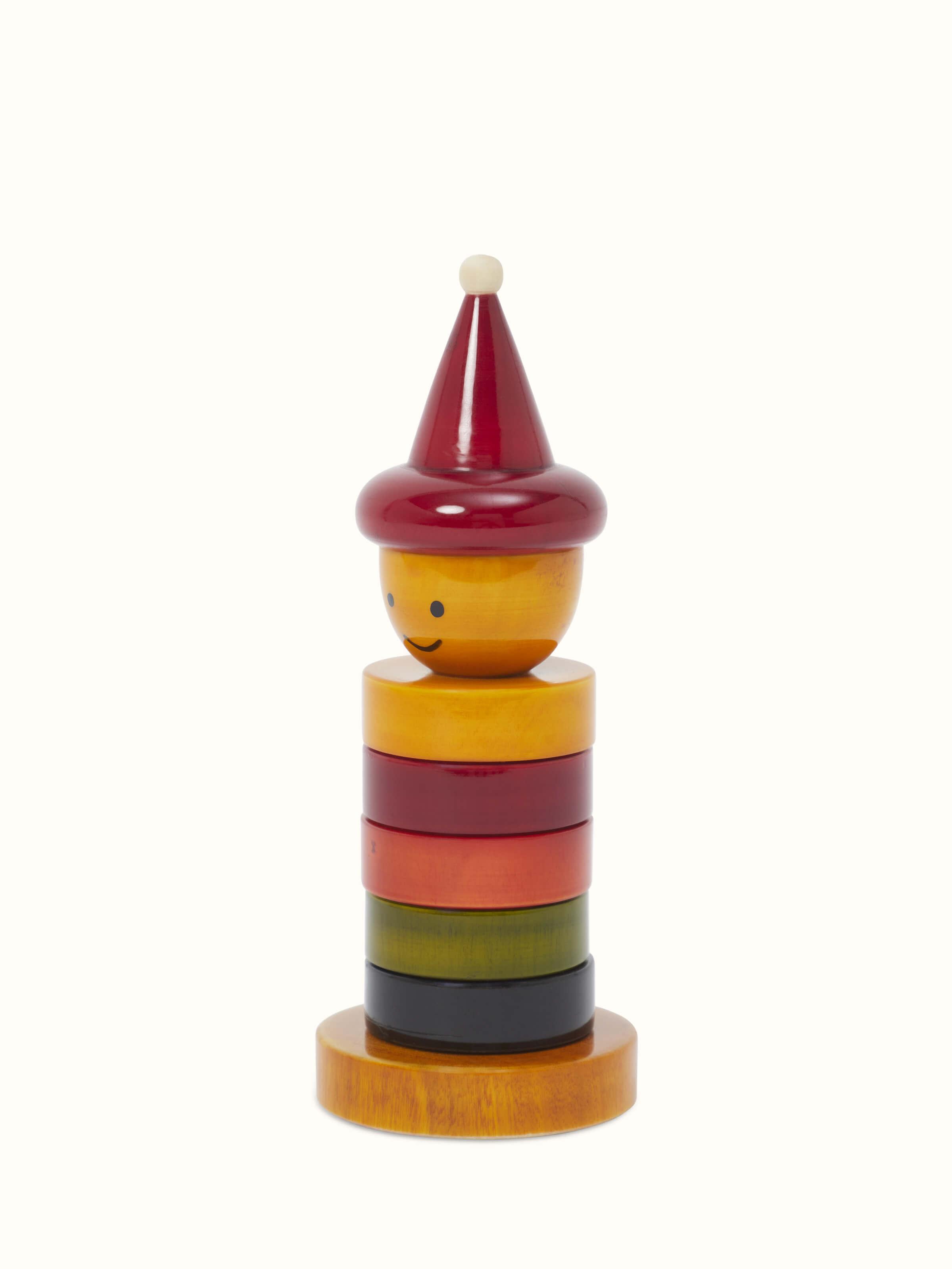 Back view of Channapatna ivory wood stack-a-joker, emphasizing its artistic details and wood finish.
