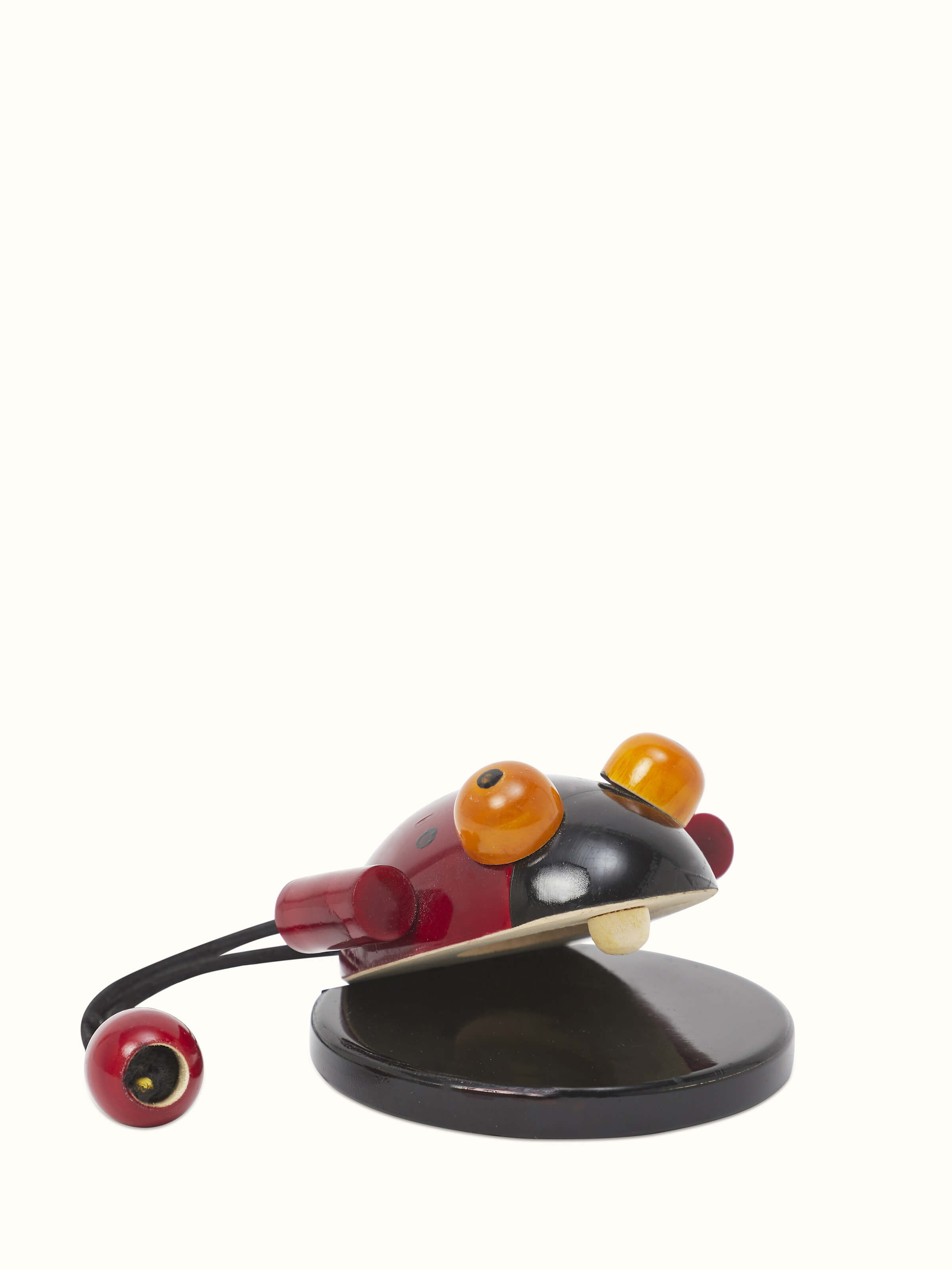 Front view of Channapatna wooden noisy bug toy with vibrant design and playful appeal