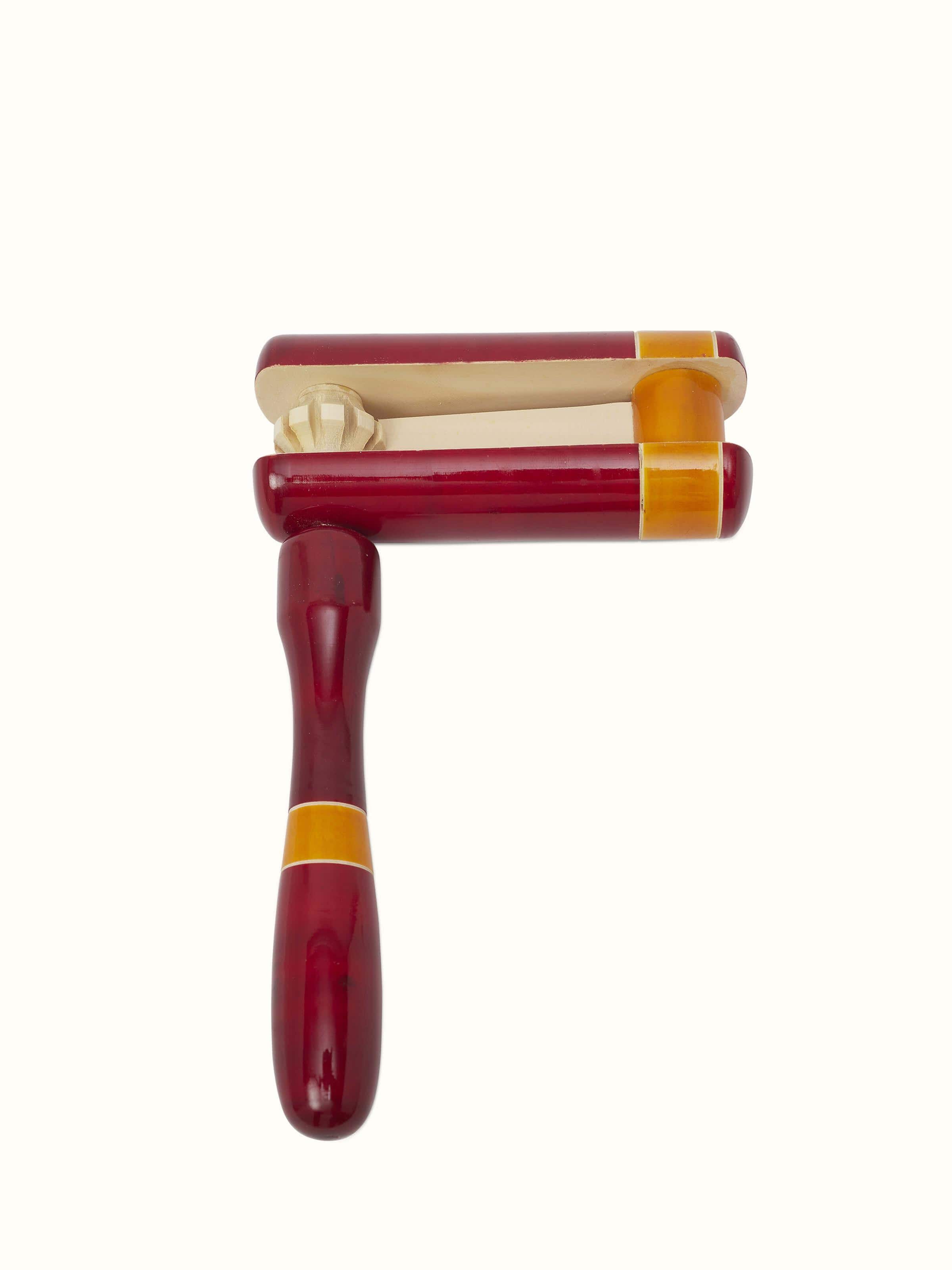 Front view of Channapatna Wooden Tic-Tic Toy, showcasing the colorful design and wooden texture