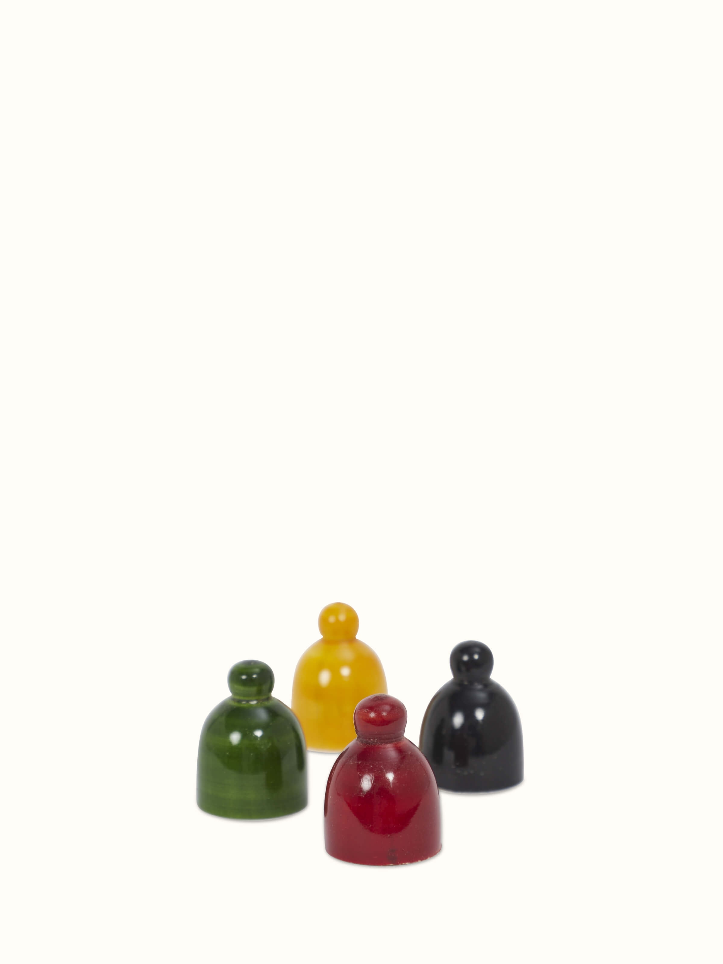 Side view of Channapatna ivory wood snake and ladders board game in white