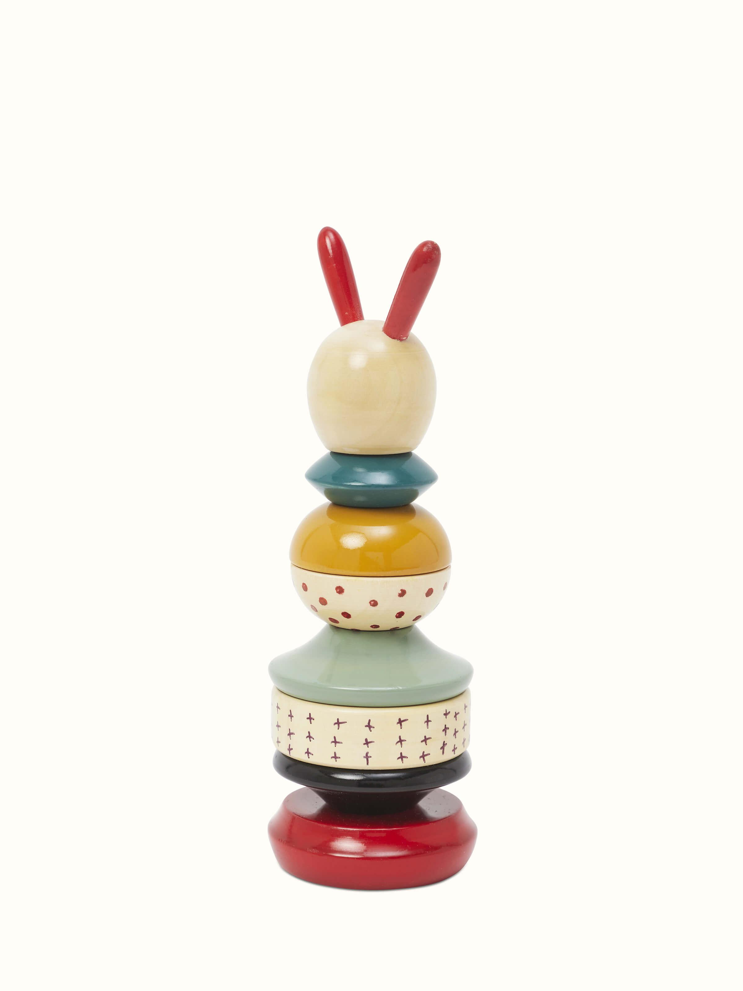 Front view of Channapatna ivory wood long rabbit stacking toy in white, highlighting its playful design