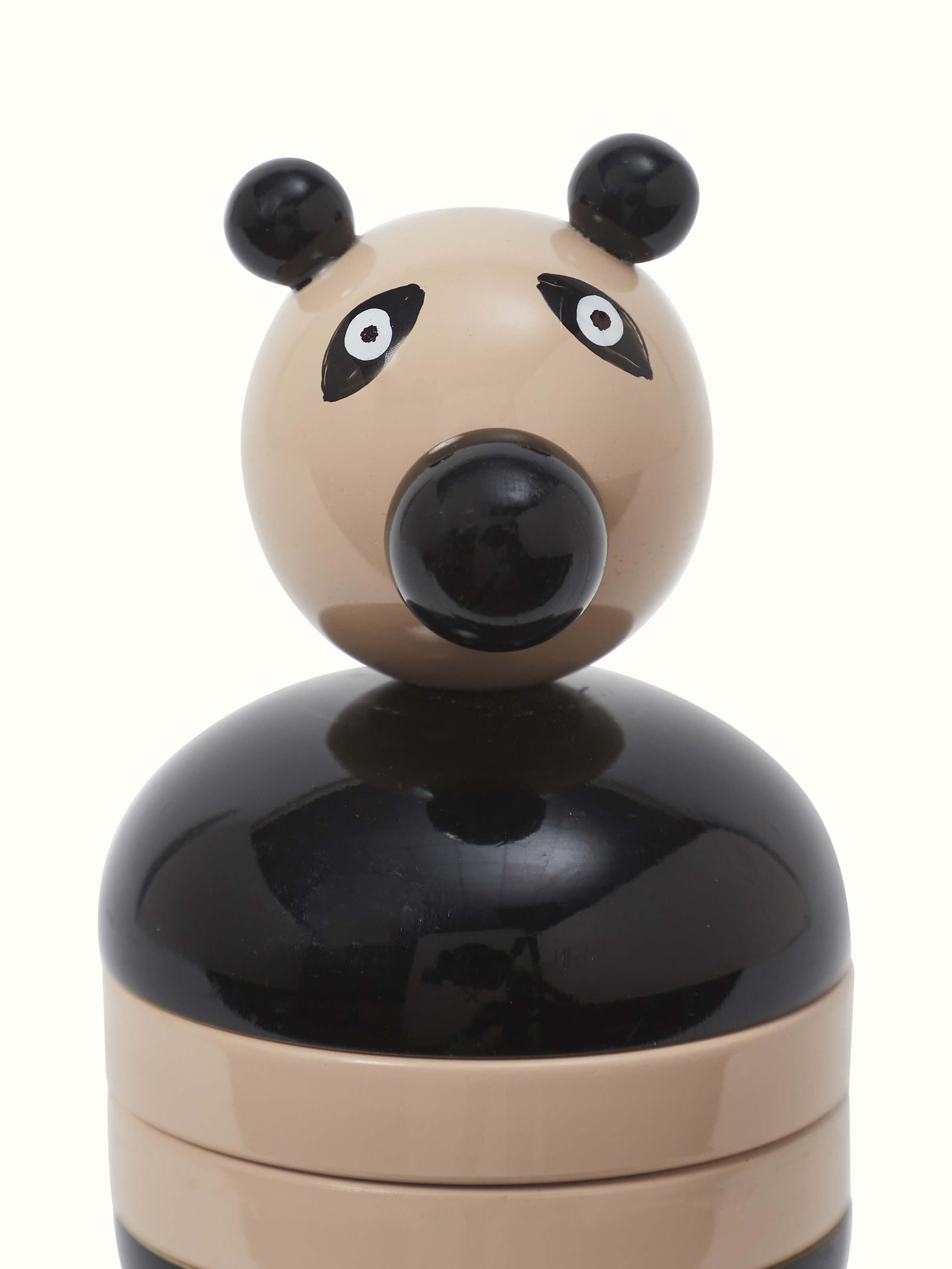 Detailed view of Channapatna ivory wood panda counting stacking toy in off-white focusing on craftsmanship.