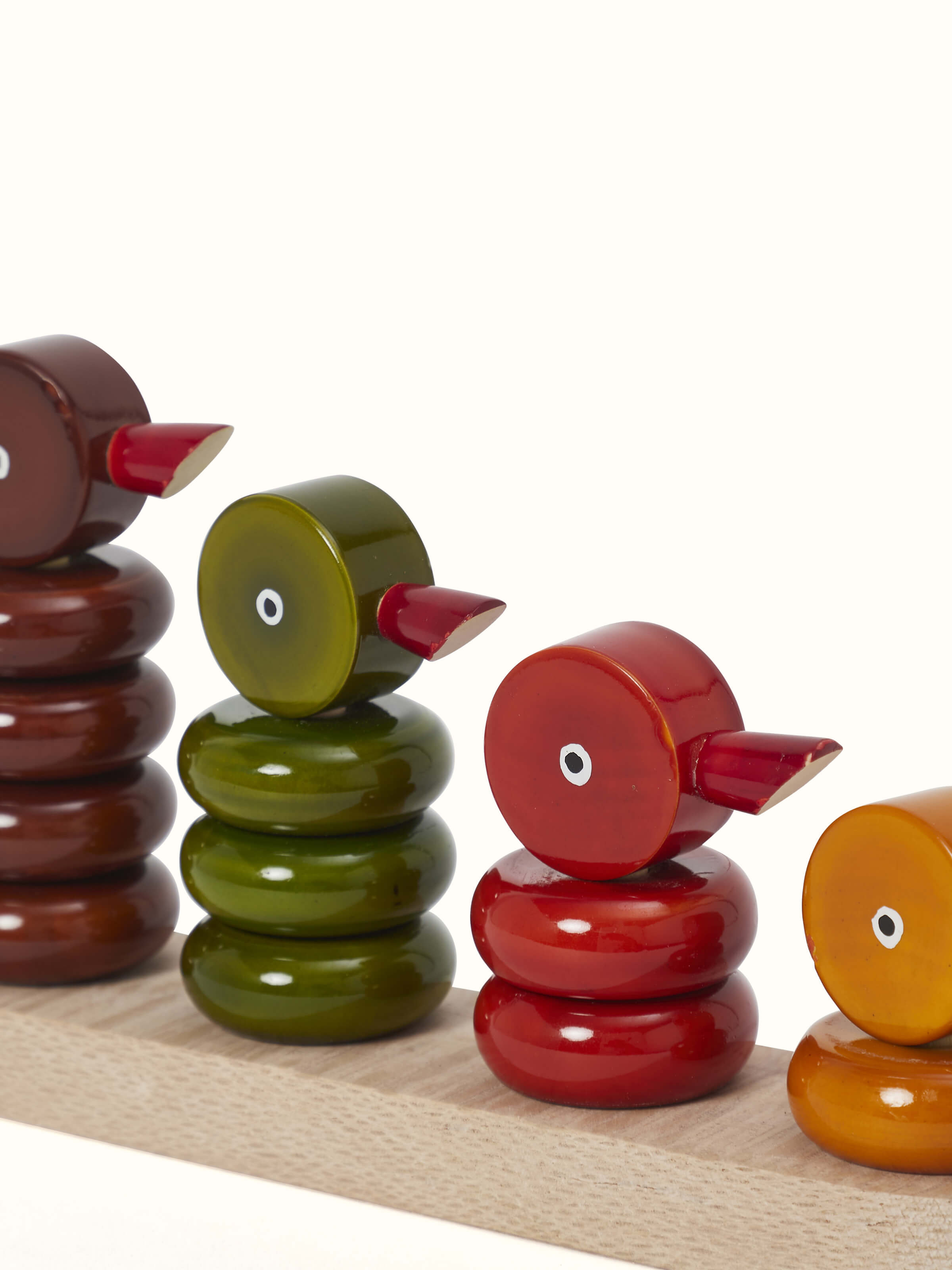 Side view of Channapatna Ivory Wood Stacking Ducks (4 pcs) displaying its elegant design