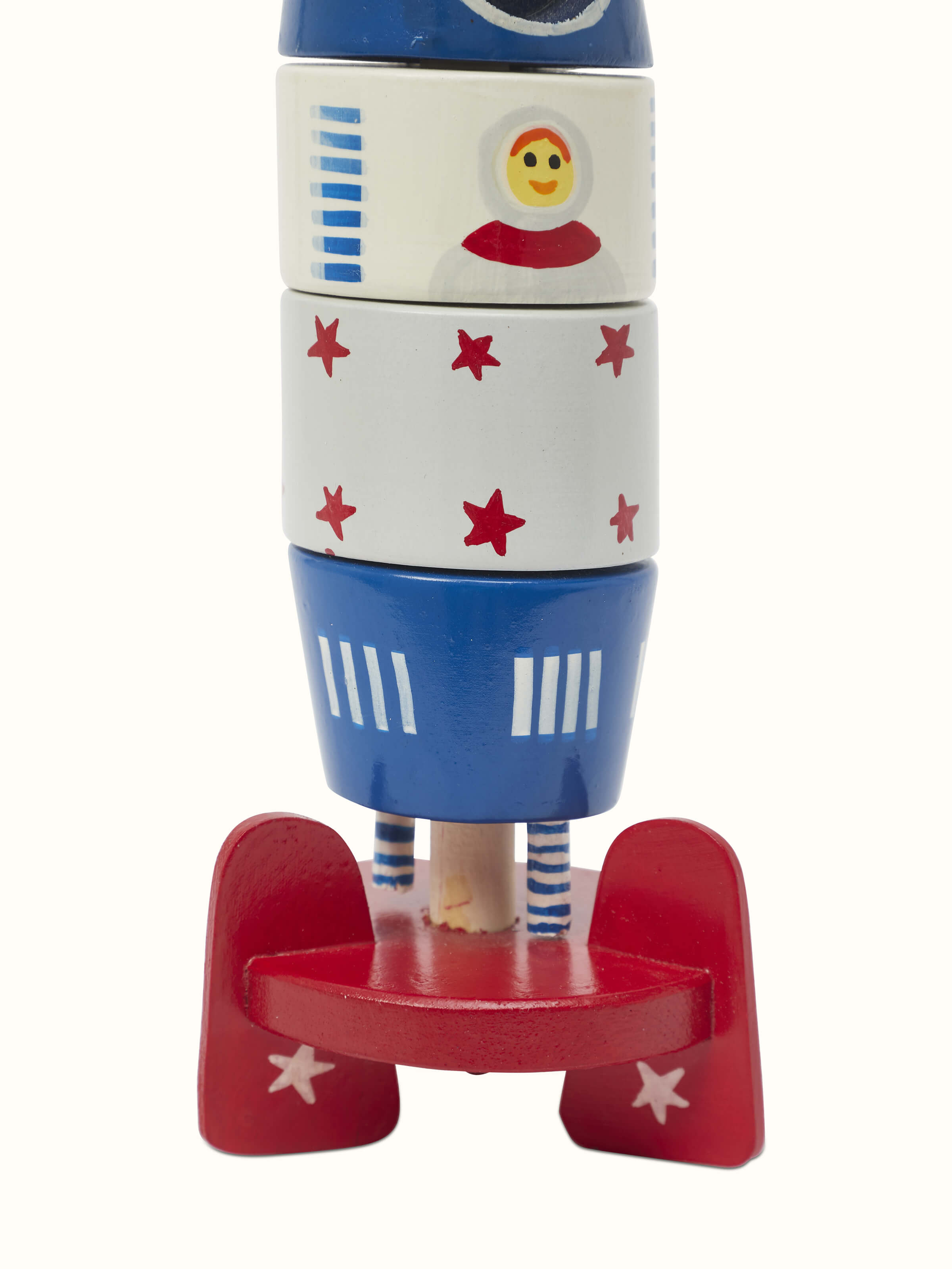 Angled view of Channapatna Ivory Wood Rocket White, showcasing the details and overall design