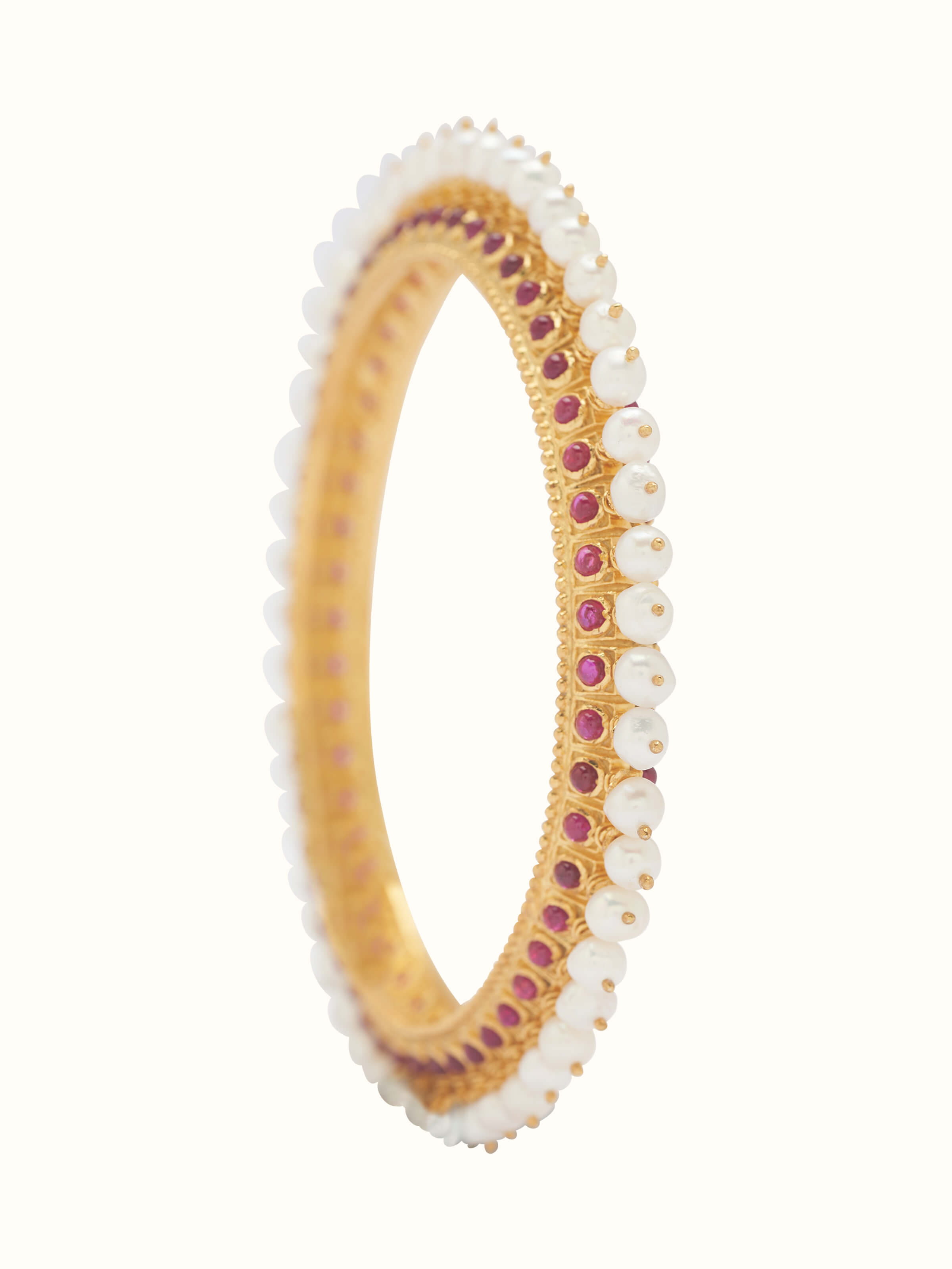 Front view showcasing the intricate Guttapusalu design on the silver bangle