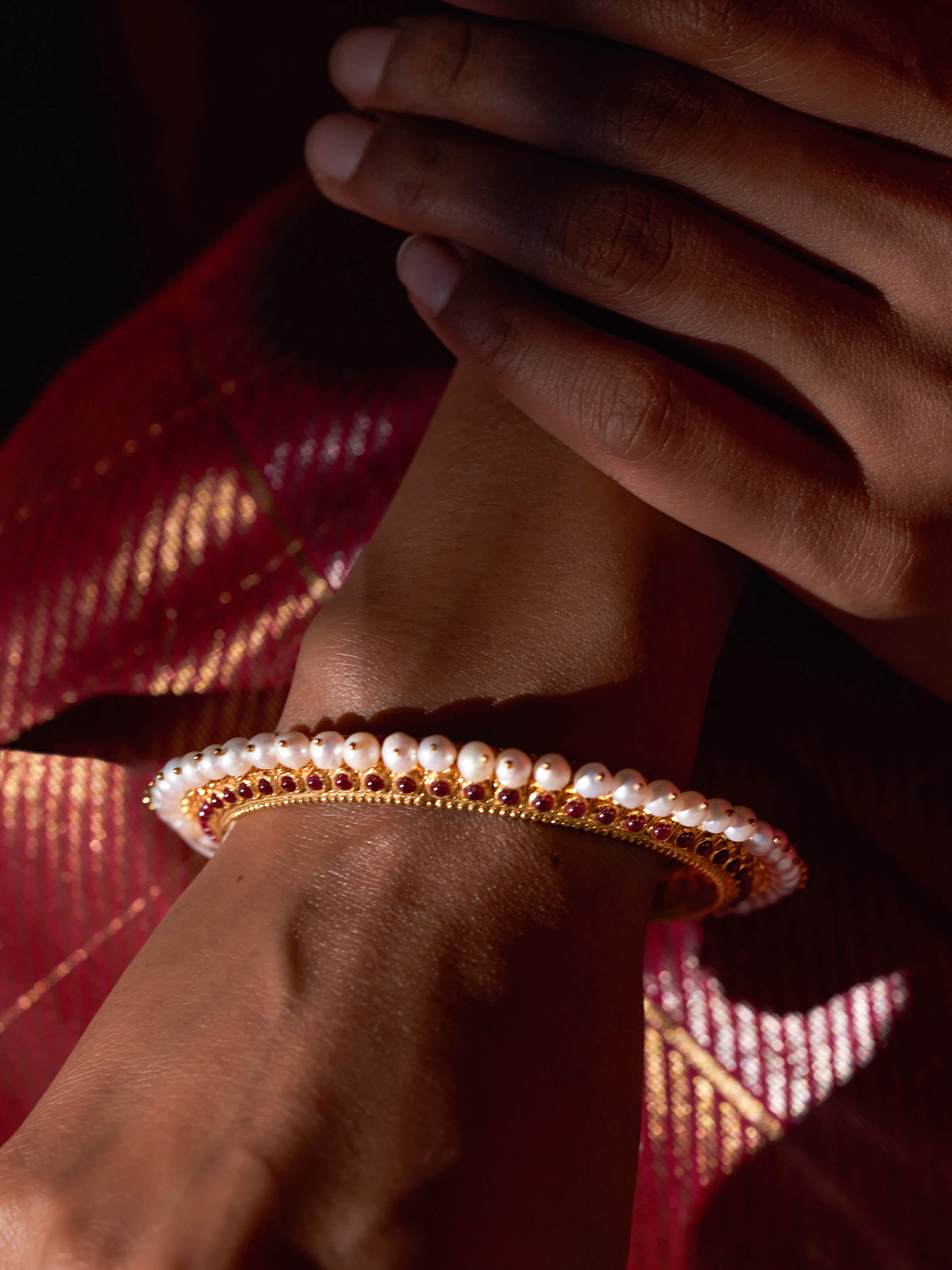 Detailed close-up of the delicate silver work and pattern