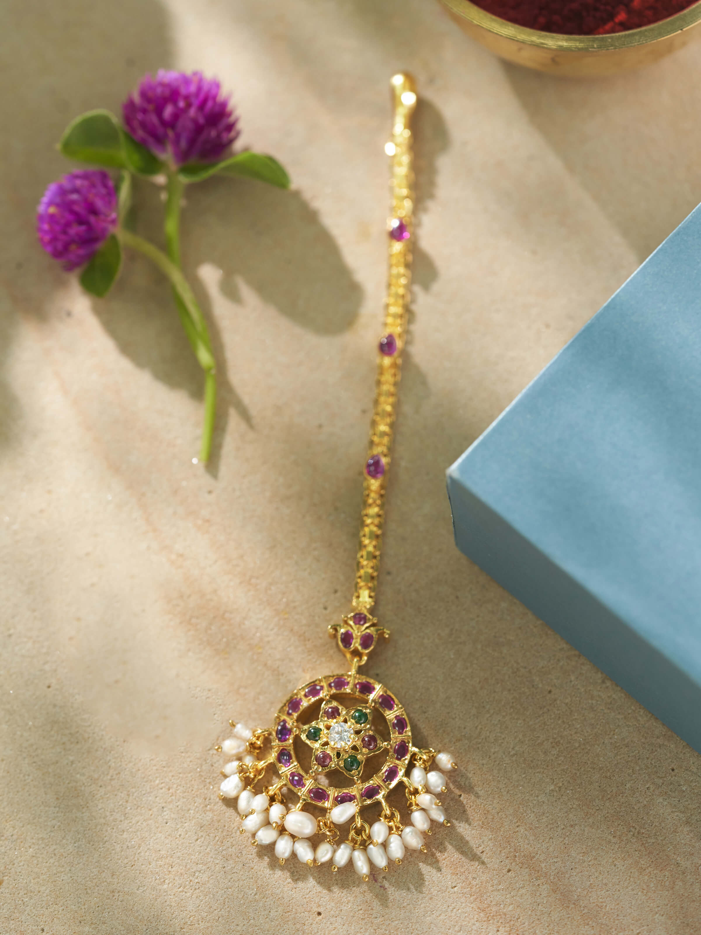 Side view of Guttapusalu silver maangtika emphasizing handcrafted silver work and fine detailing