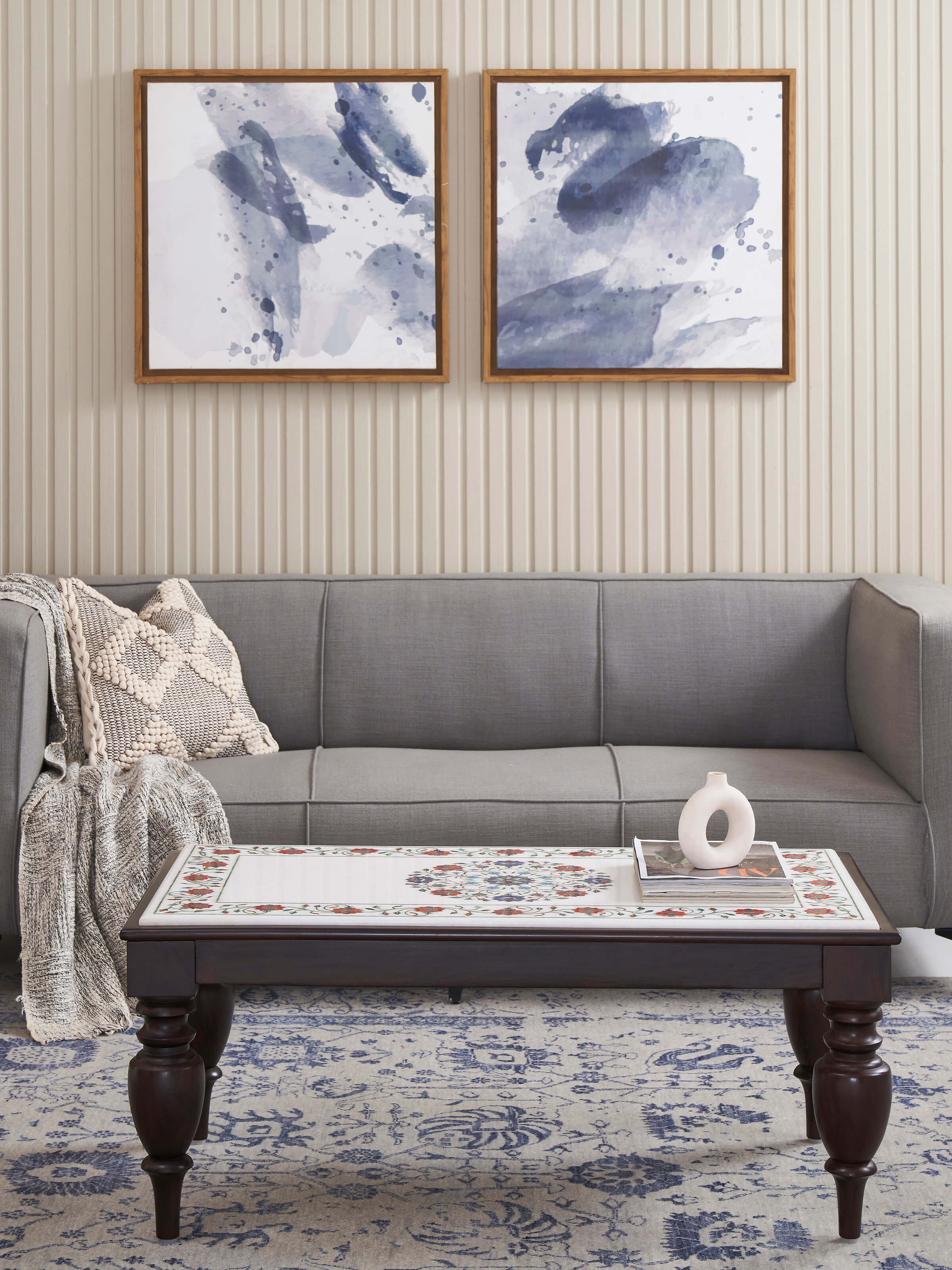 Side view of the rectangular marble inlaid Sheesham wood coffee table, highlighting its sleek design and craftsmanship.