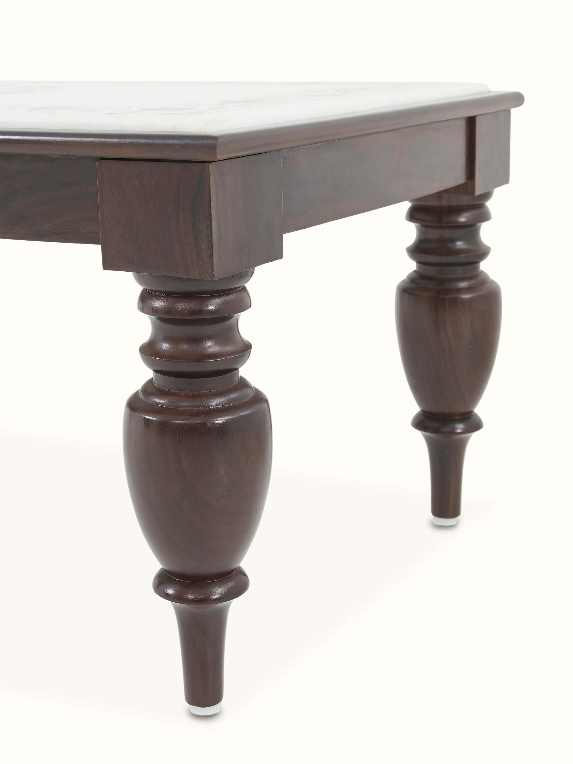 Close-up view of the marble inlay on the Sheesham wood coffee table, focusing on the intricate detailing and design.