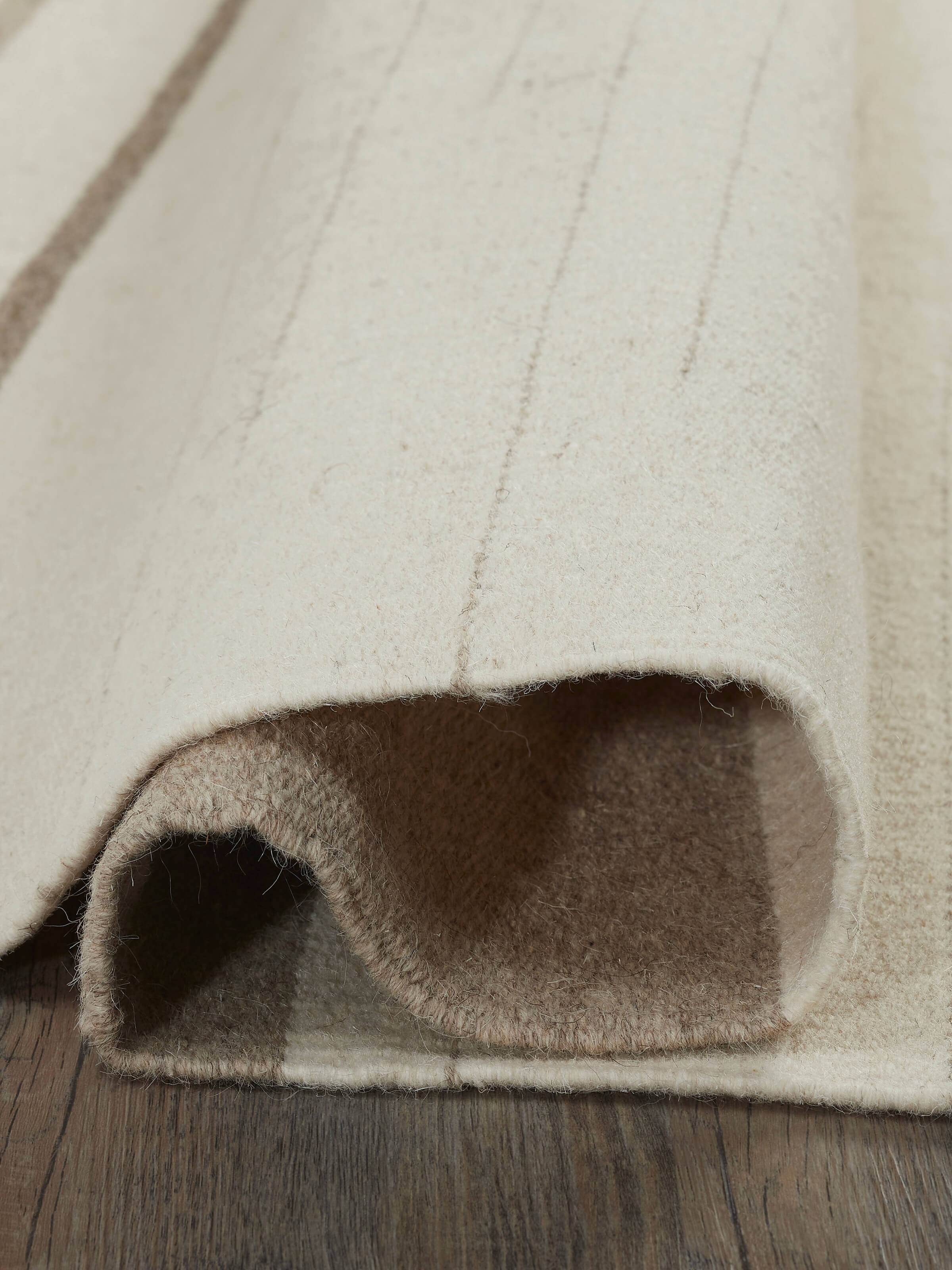 Full view of Nomad Stripes Ivory Beige Jawaja wool & cotton handloom dhurrie highlighting the handloom quality and stripe detail.