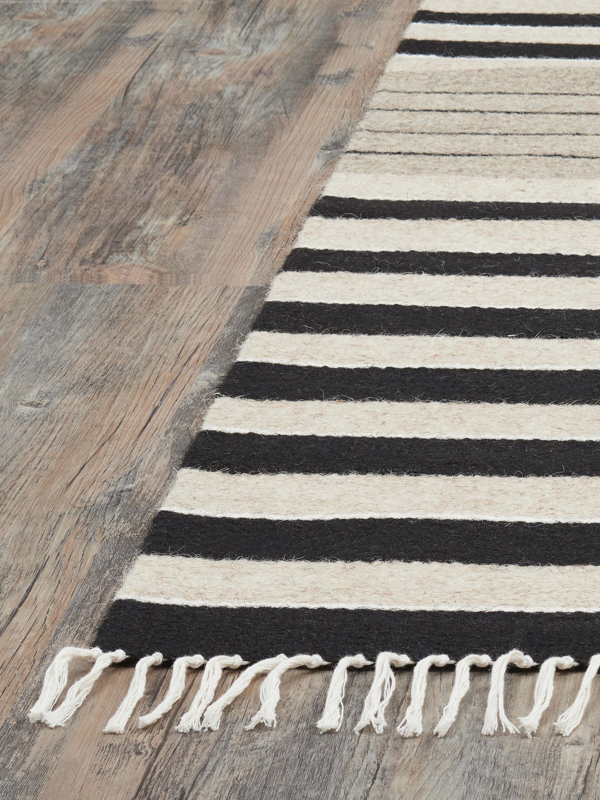 Close-up of Nomad Stripes Black Beige Jawaja Wool & Cotton Handloom Dhurrie (4x6 ft) showing wool and cotton blend