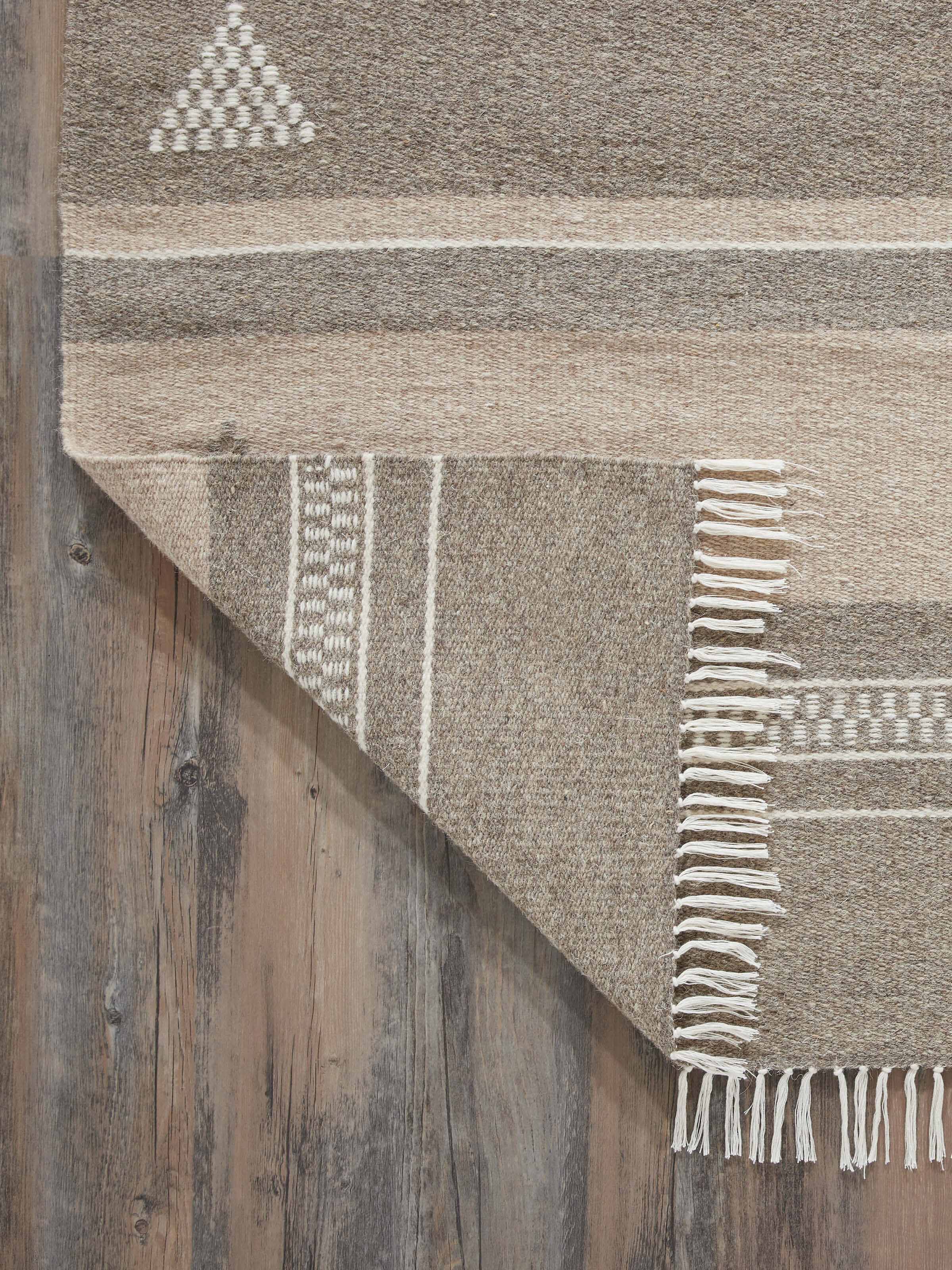 Detailed view of Nomad Stripes Buti Beige Jawaja Wool & Cotton Handloom Dhurrie (4x6 ft) focusing on the wool and cotton blend.