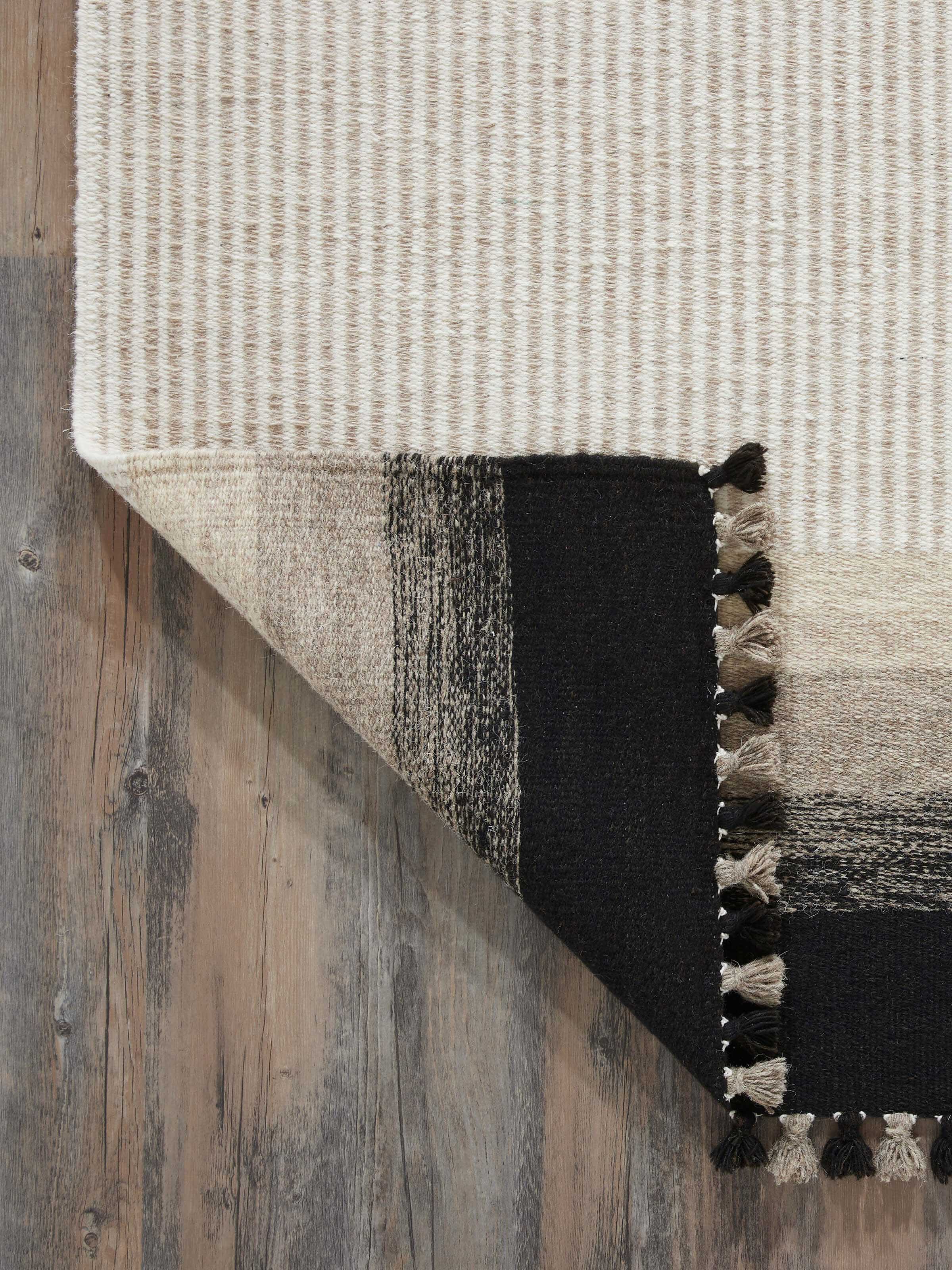 Full view of Textured Stripes Beige Black Jawaja Wool & Cotton Handloom Dhurrie, emphasizing the handloom craftsmanship and color scheme.