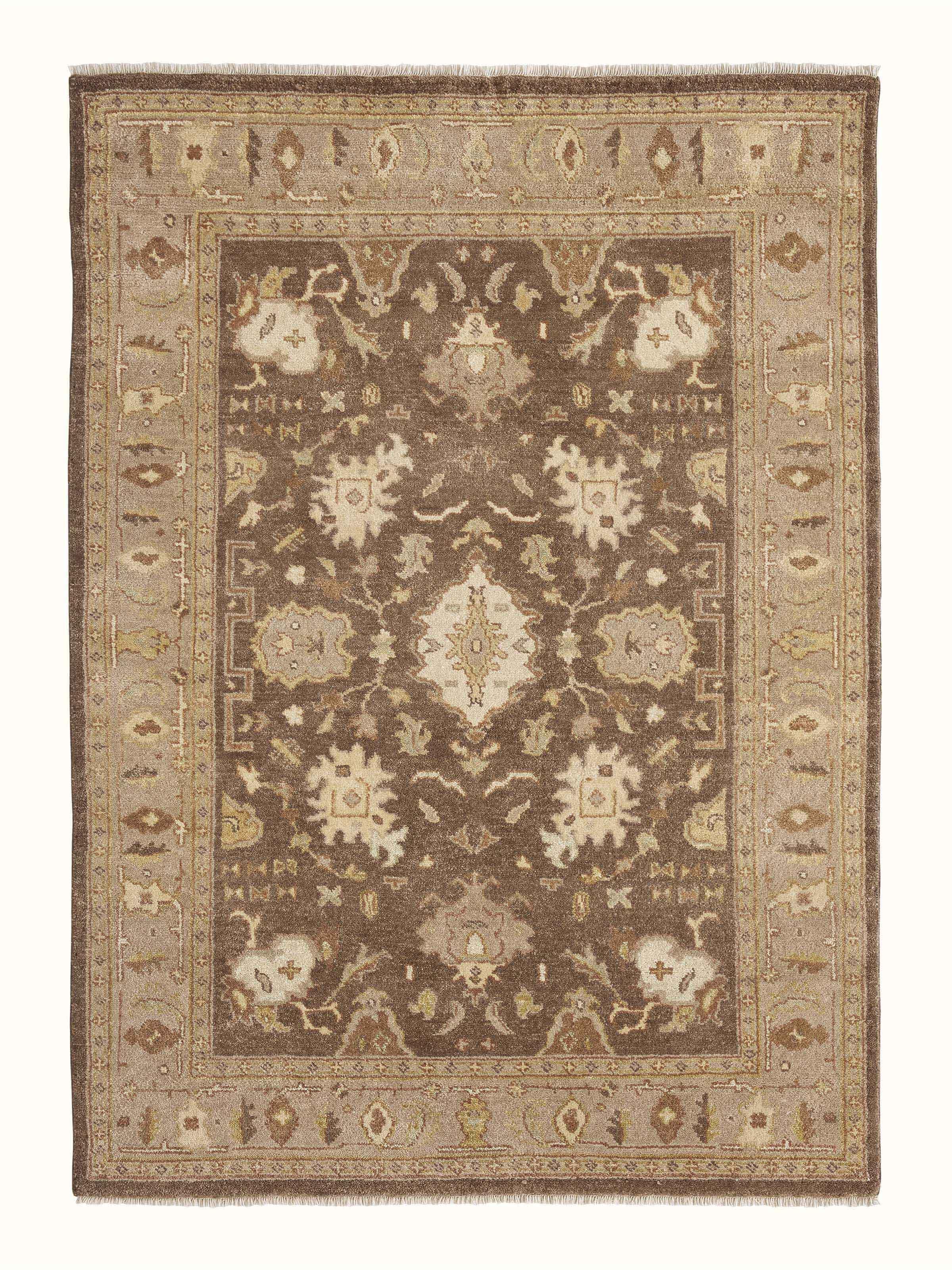 Full view of Oushak traditional brown Jaipur wool hand-knotted rug, highlighting the intricate design and rich brown tones.