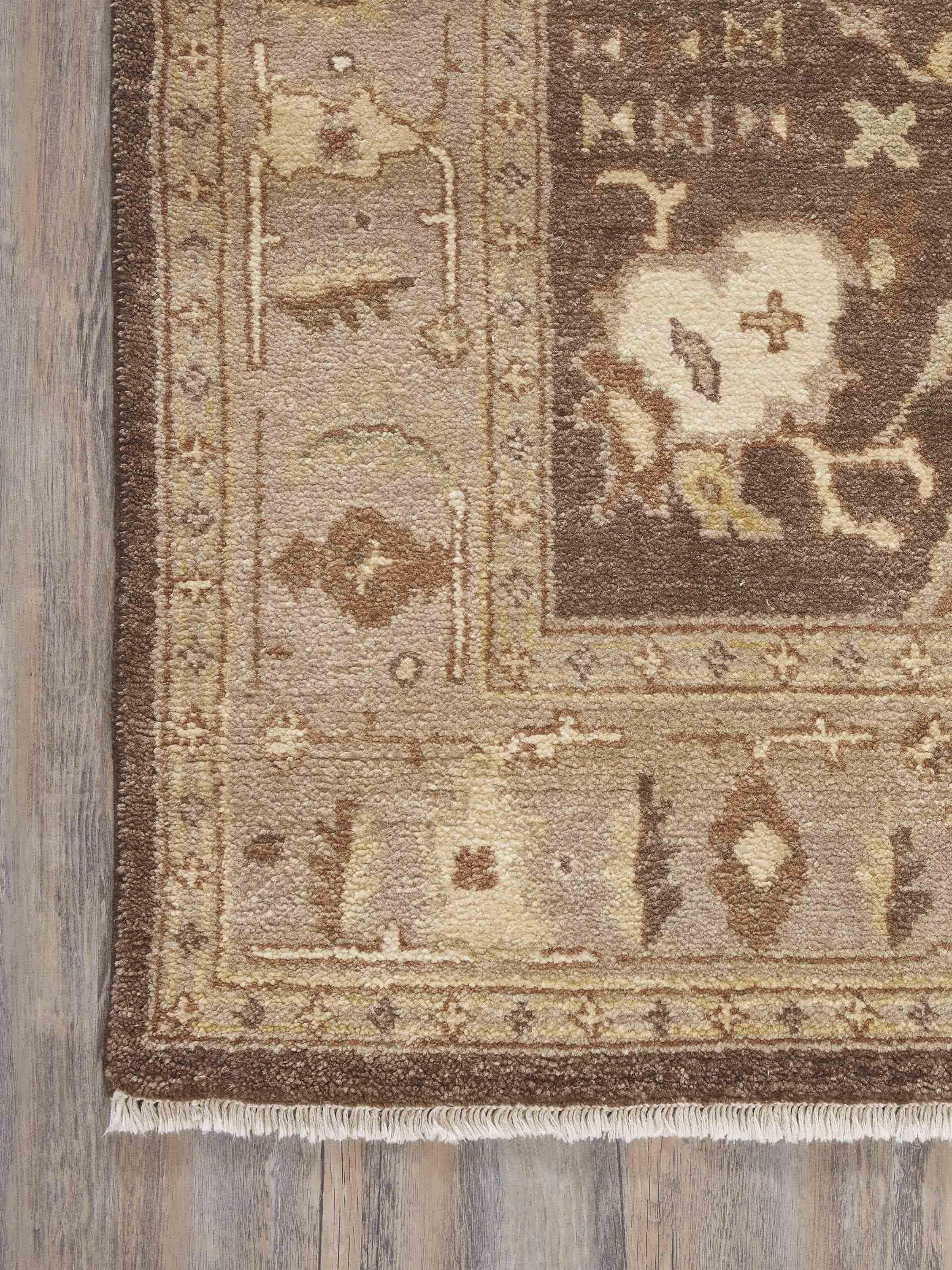 Side view of Oushak traditional brown Jaipur wool hand-knotted rug, focusing on the thickness and quality of the wool.