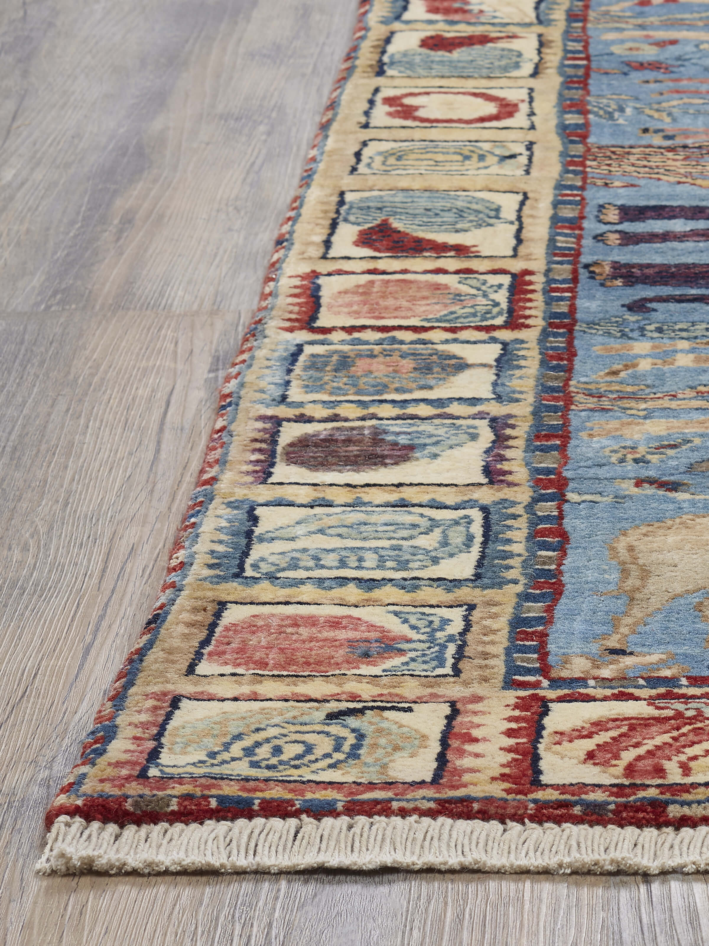 Detailed view of Traditional pazyryk Jaipur wool hand-knotted rug highlighting its intricate design and texture