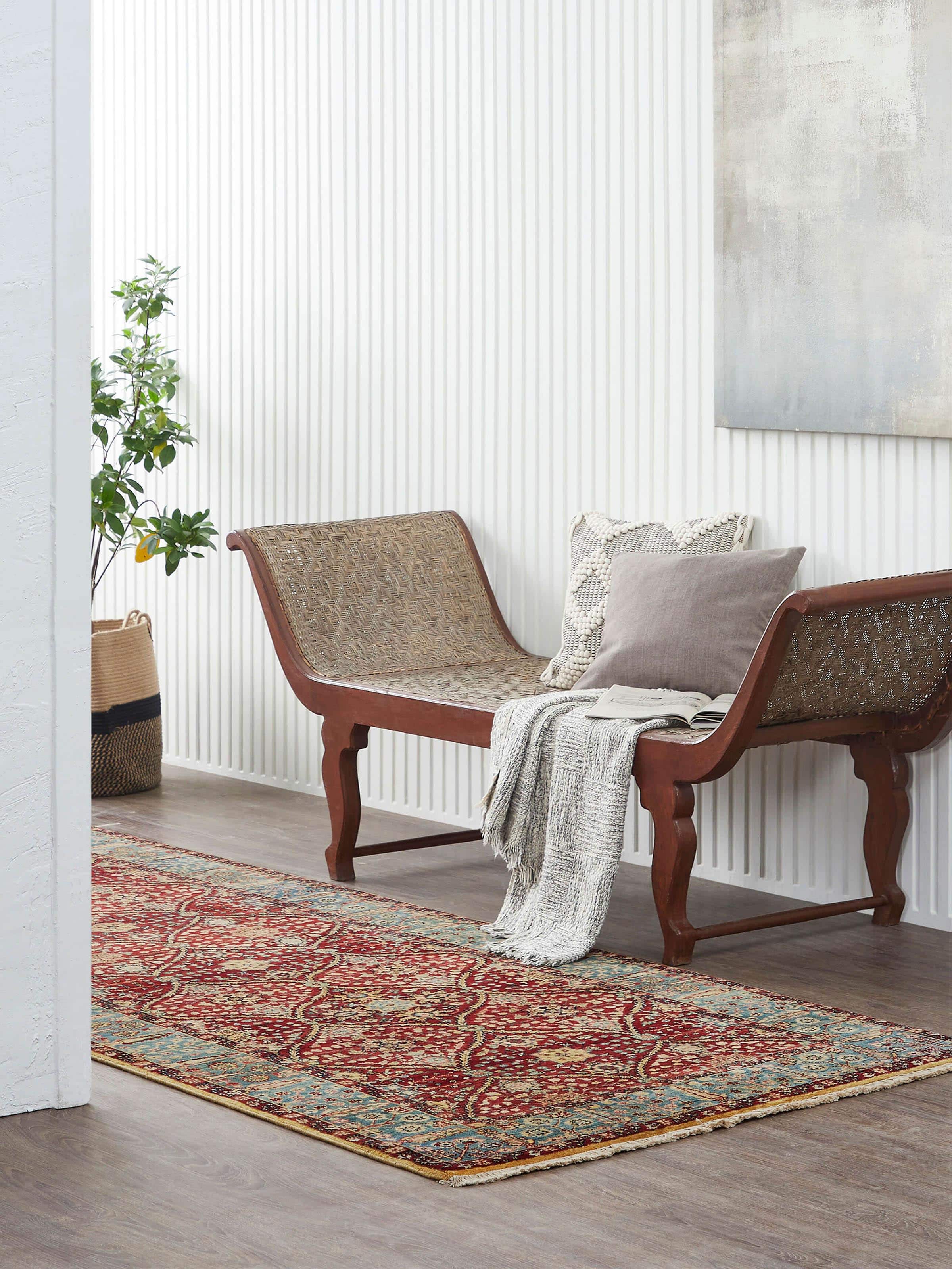 Lifestyle view of hand-knotted red Ziegler Jaipur wool runner in a narrow hallway setting