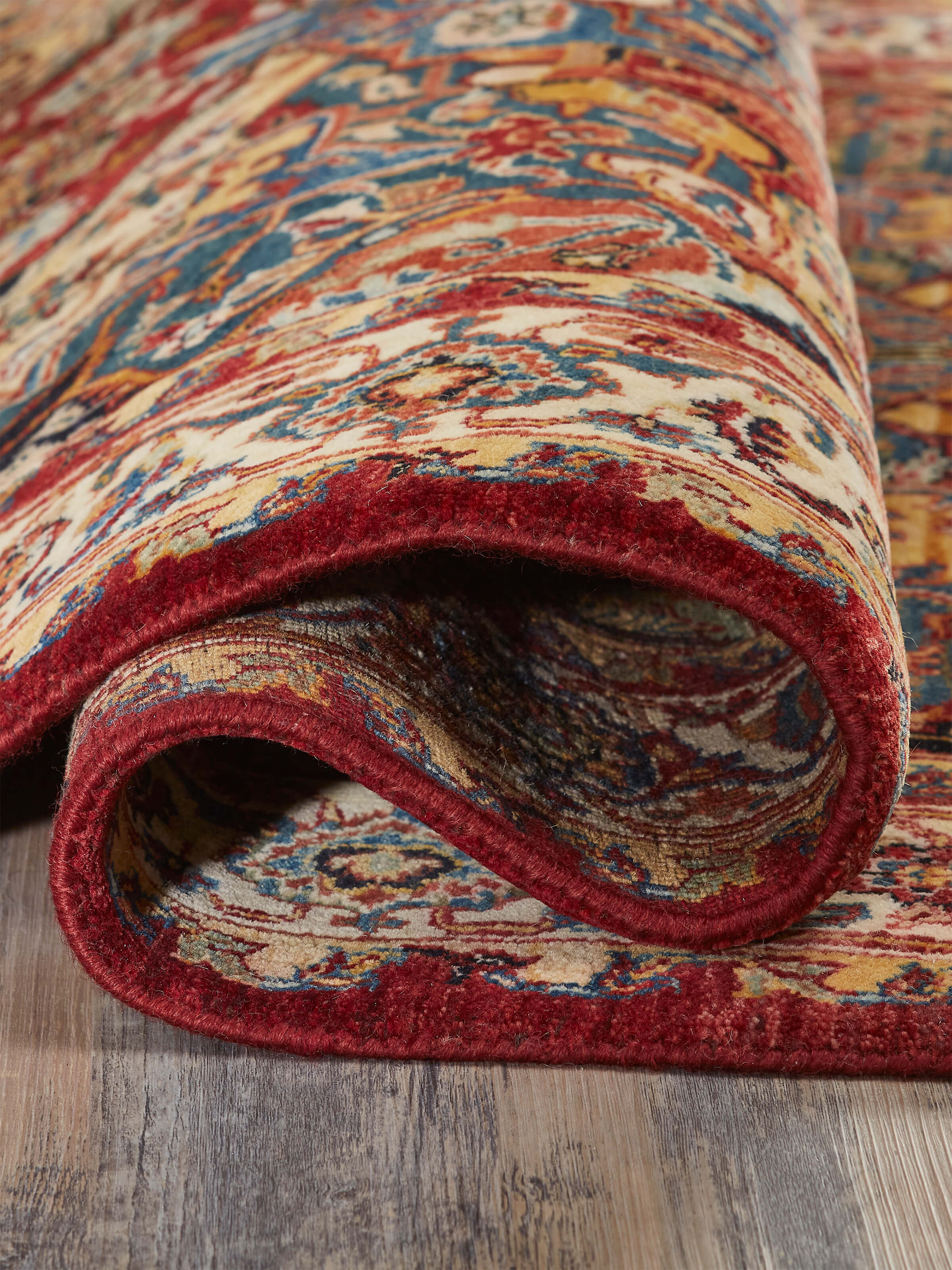 Detail shot of Traditional Heriz Rust Jaipur Wool Hand-Knotted Rug highlighting the fine craftsmanship.